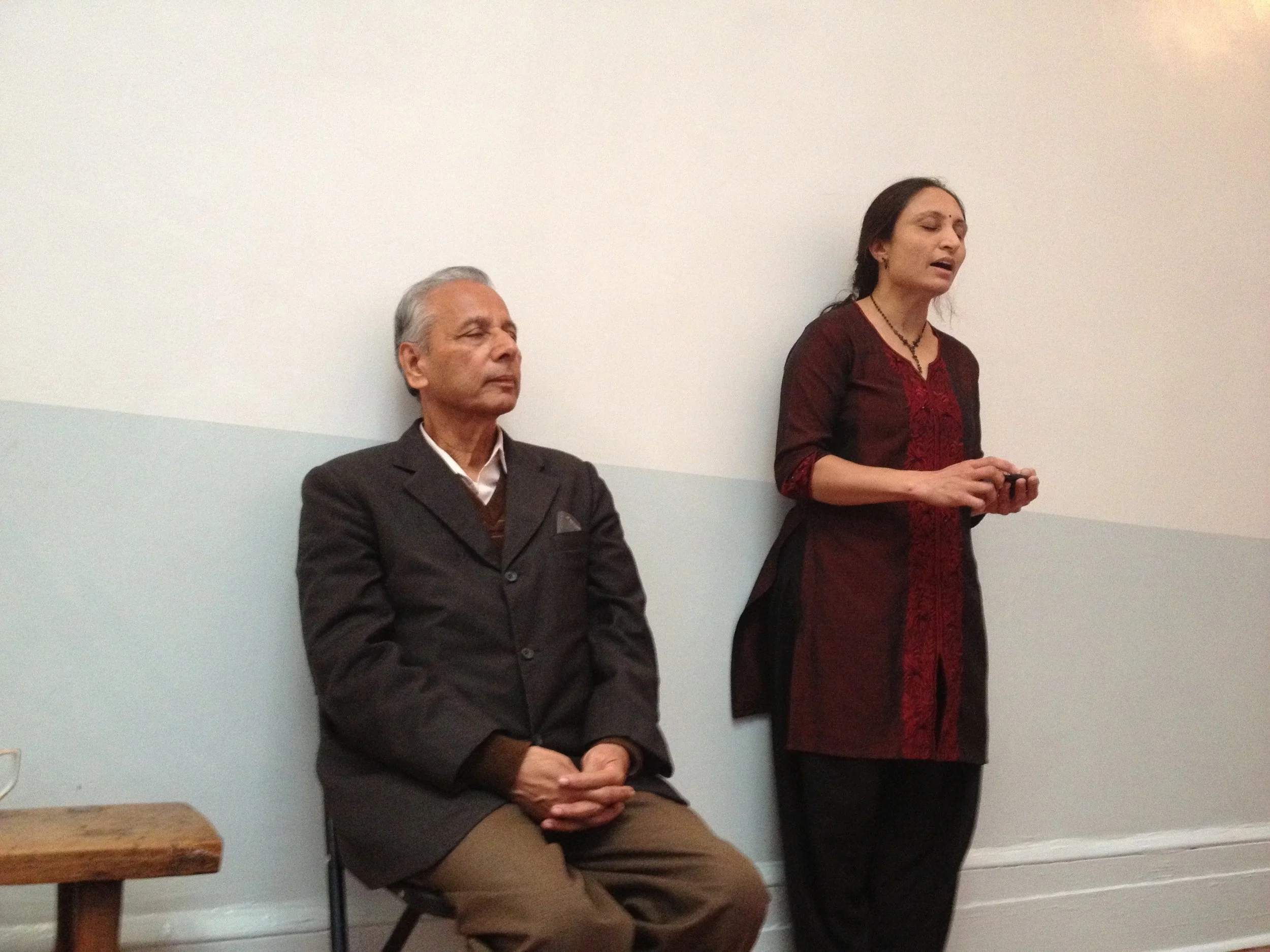 Professor H.V. Rao listening while his daughter sings.
