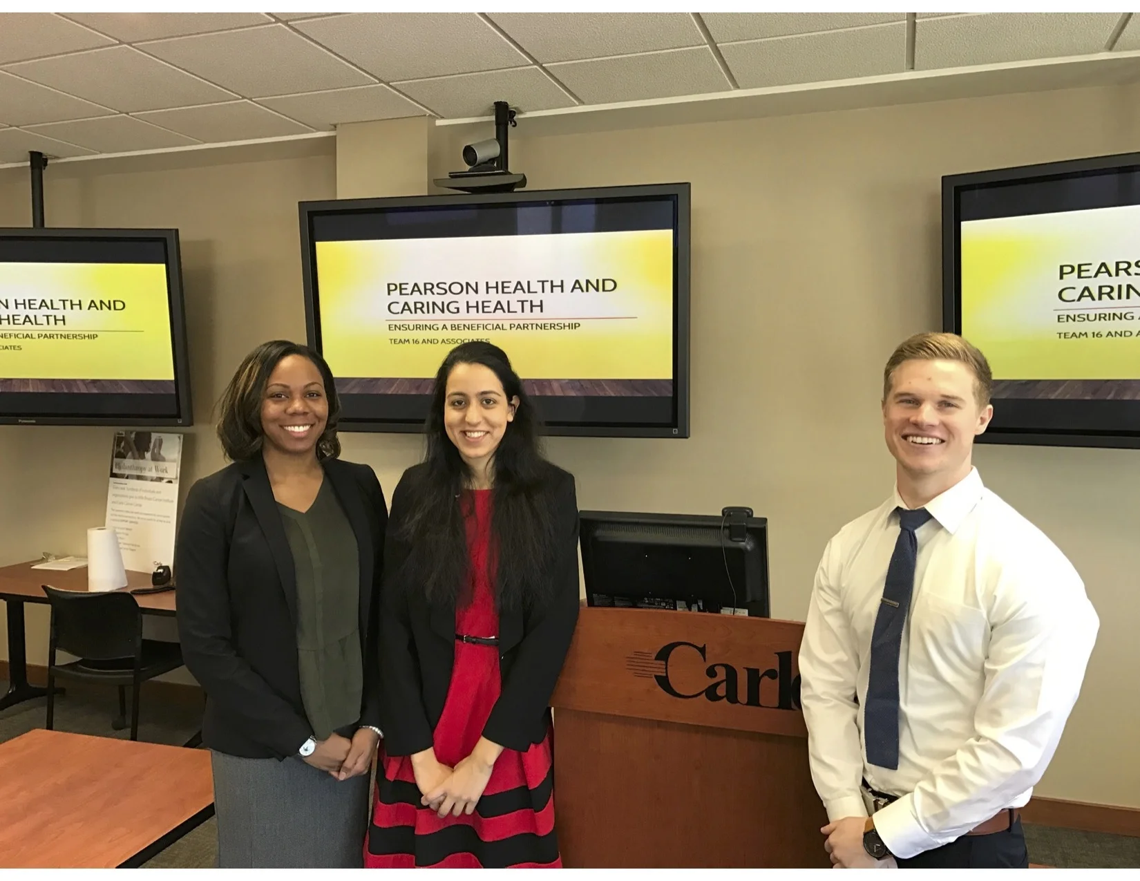 2016 Loyola Transactional Moot Court Team members Amanda Ray, Sarah Ahmed, and Daniel Walbright