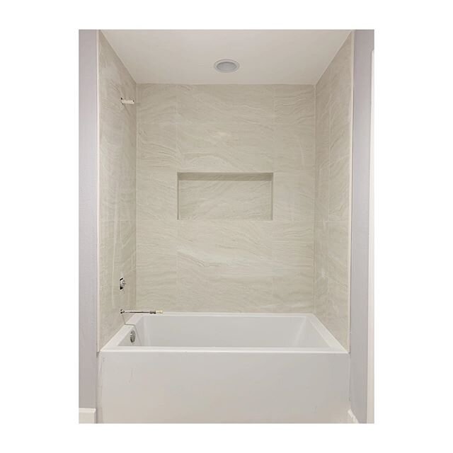 Guest Bath Tile Install.  White Honed Travertine.