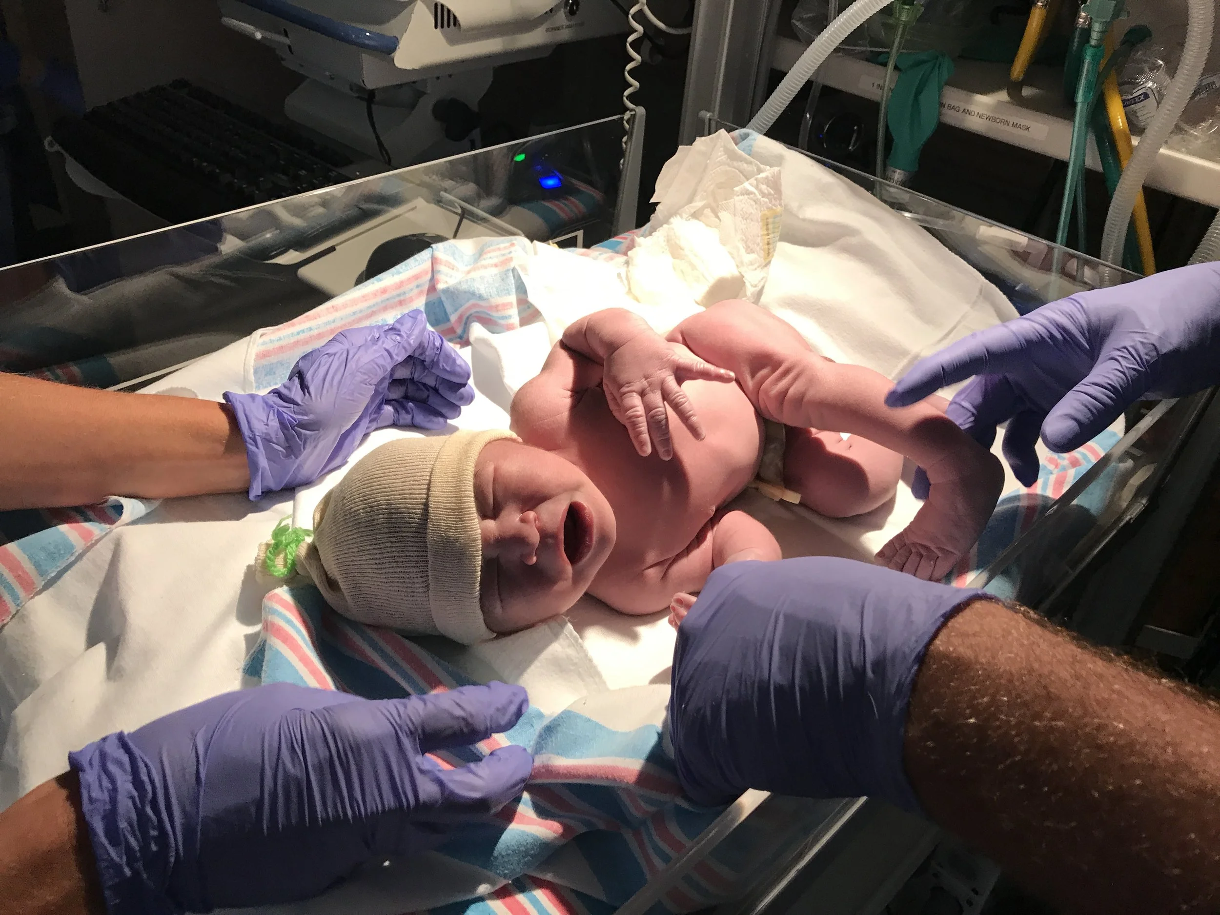 Getting cleaned up so daddy can hold him!