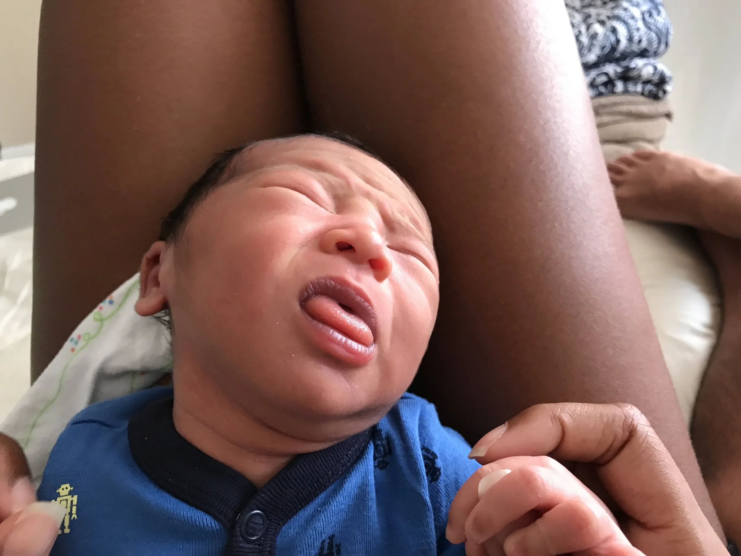 This may be the ugliest face I've ever seen on a baby.