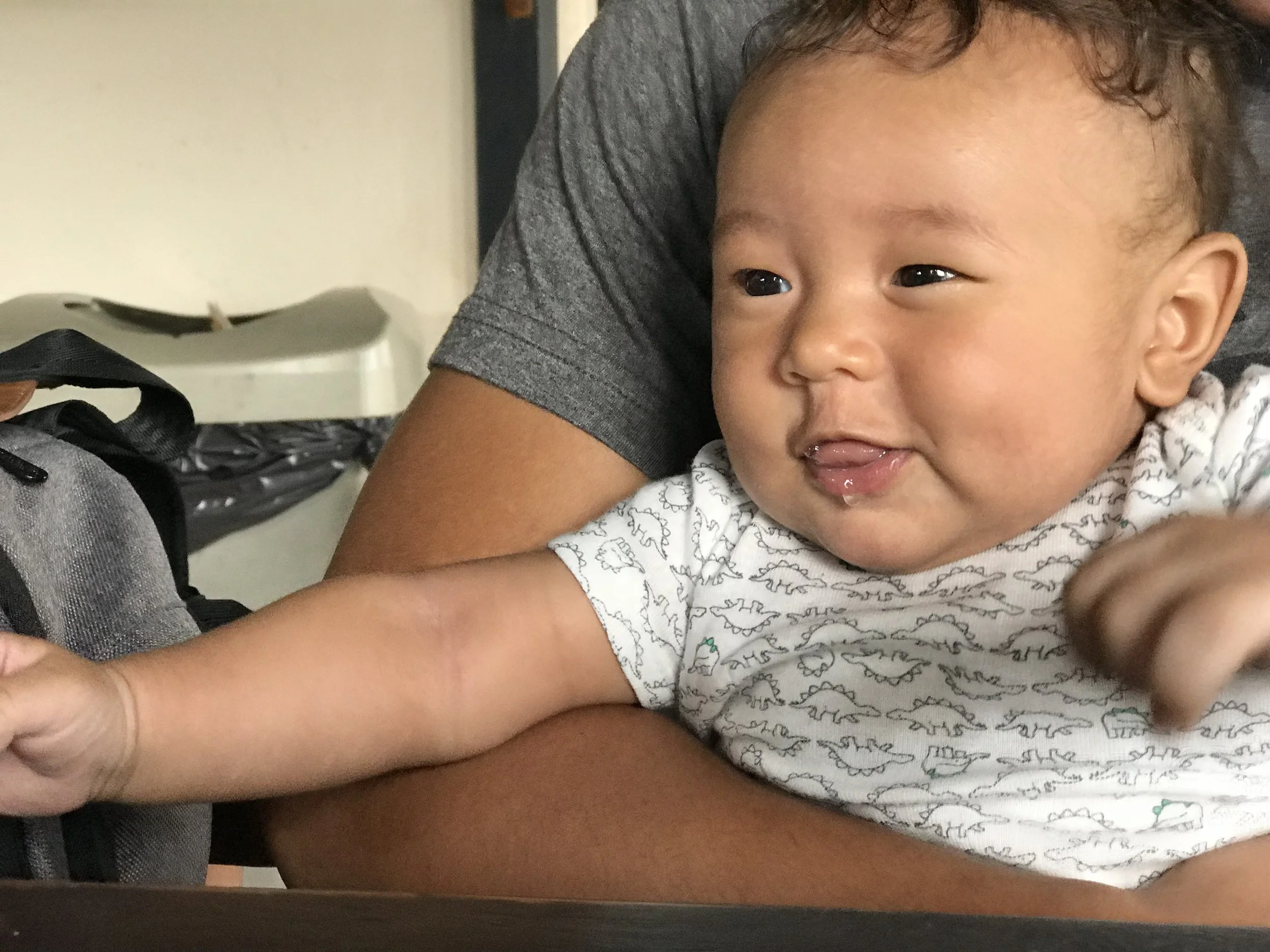 He's a happy little bean these days!