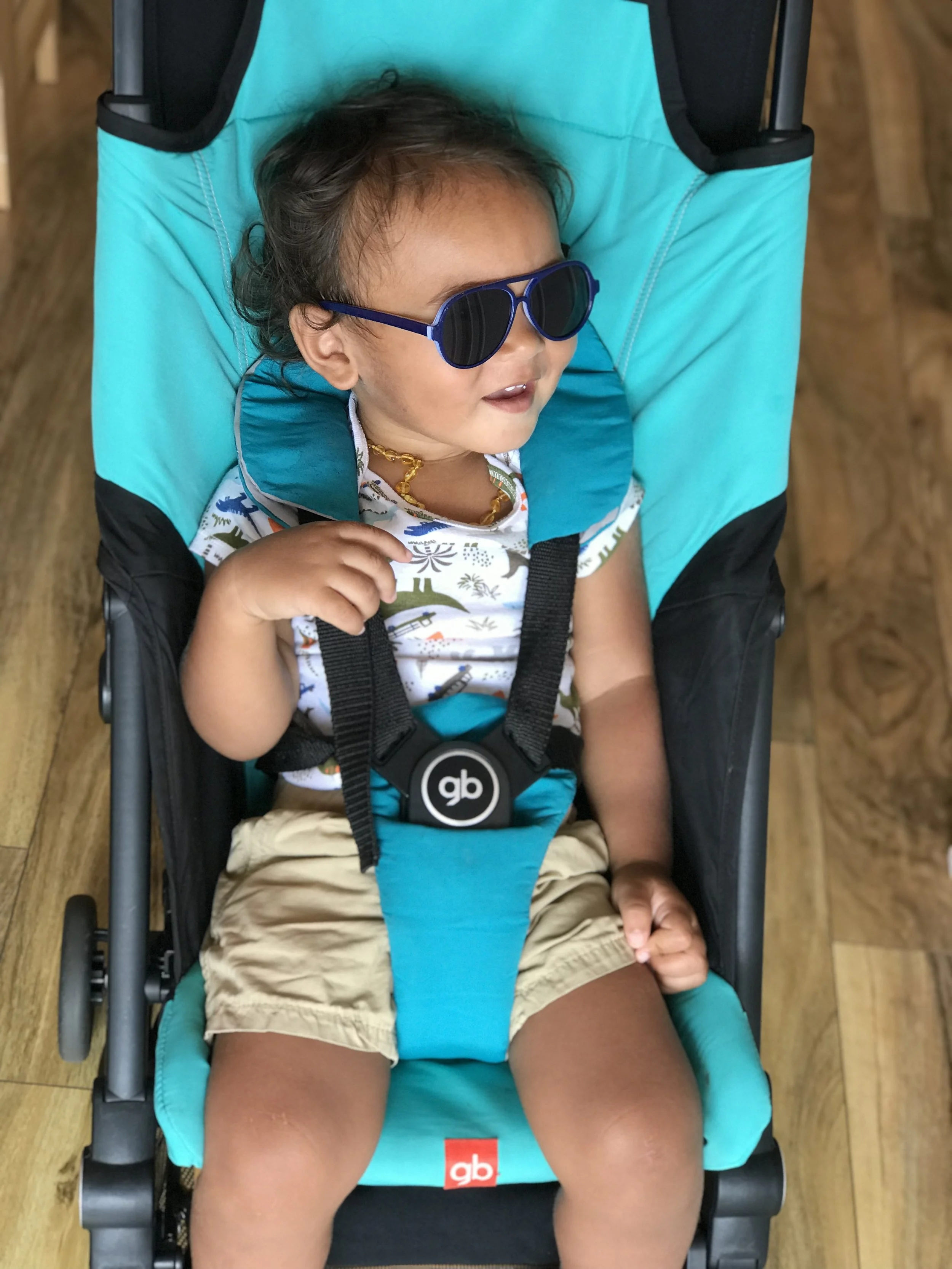 He’s been showing off how chill he is in his stroller and sunglasses.