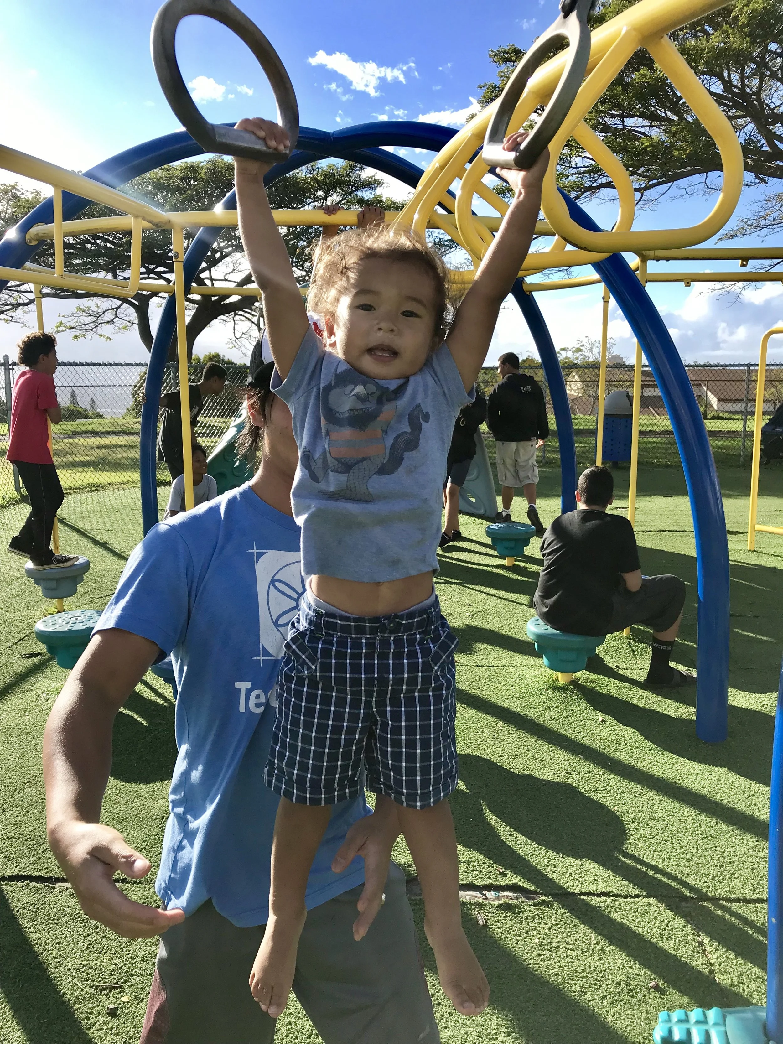 Working on our core strength with hanging leg lifts!