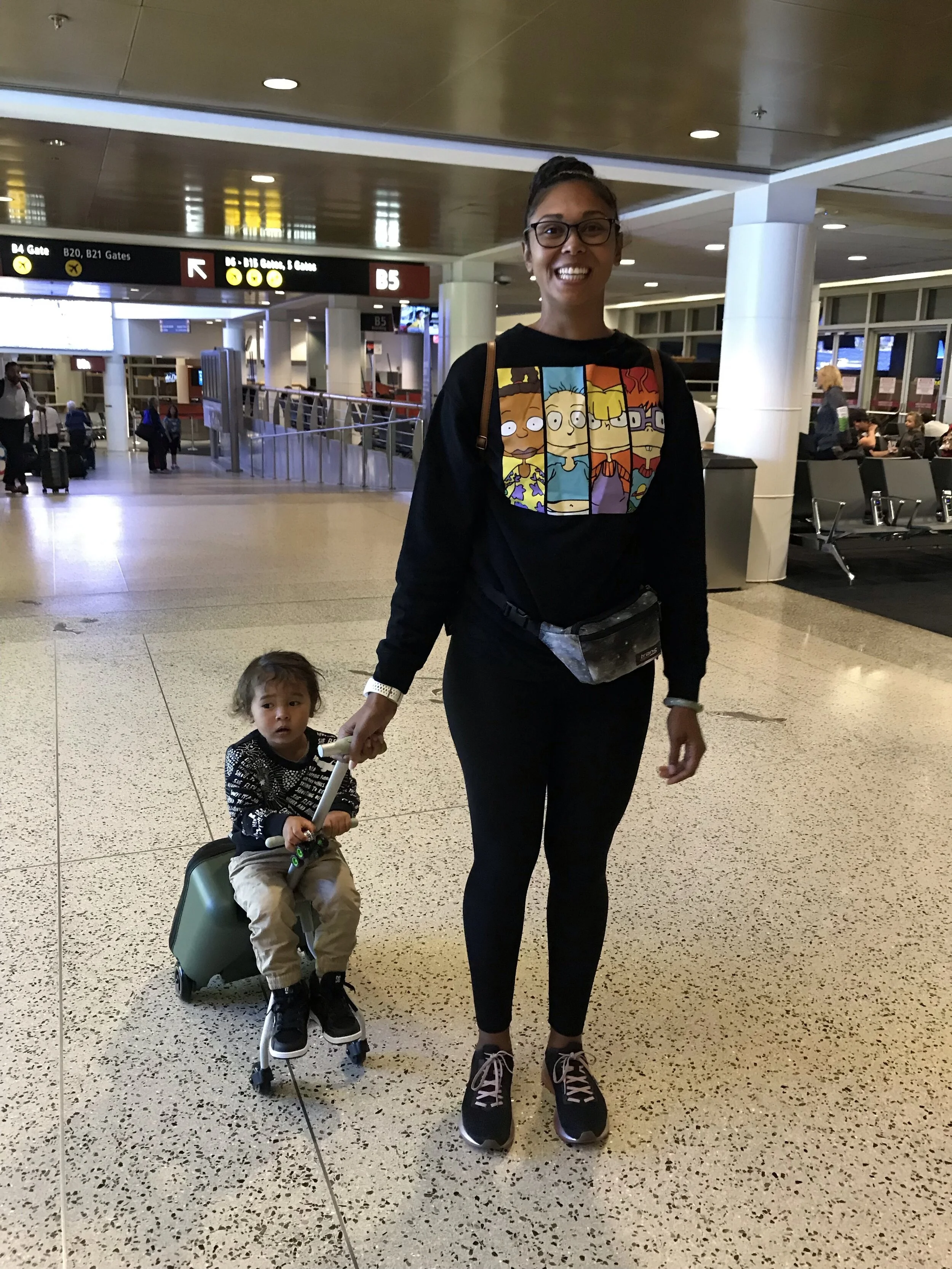 Nothing says “mom style” more than tennis shoes, fanny packs, BLACK leggings, a psychotic look that says “I' can’t believe I survived a plane ride with my toddler” and one article of clothing put on incorrectly. In this case, my sweatshirt was backw…
