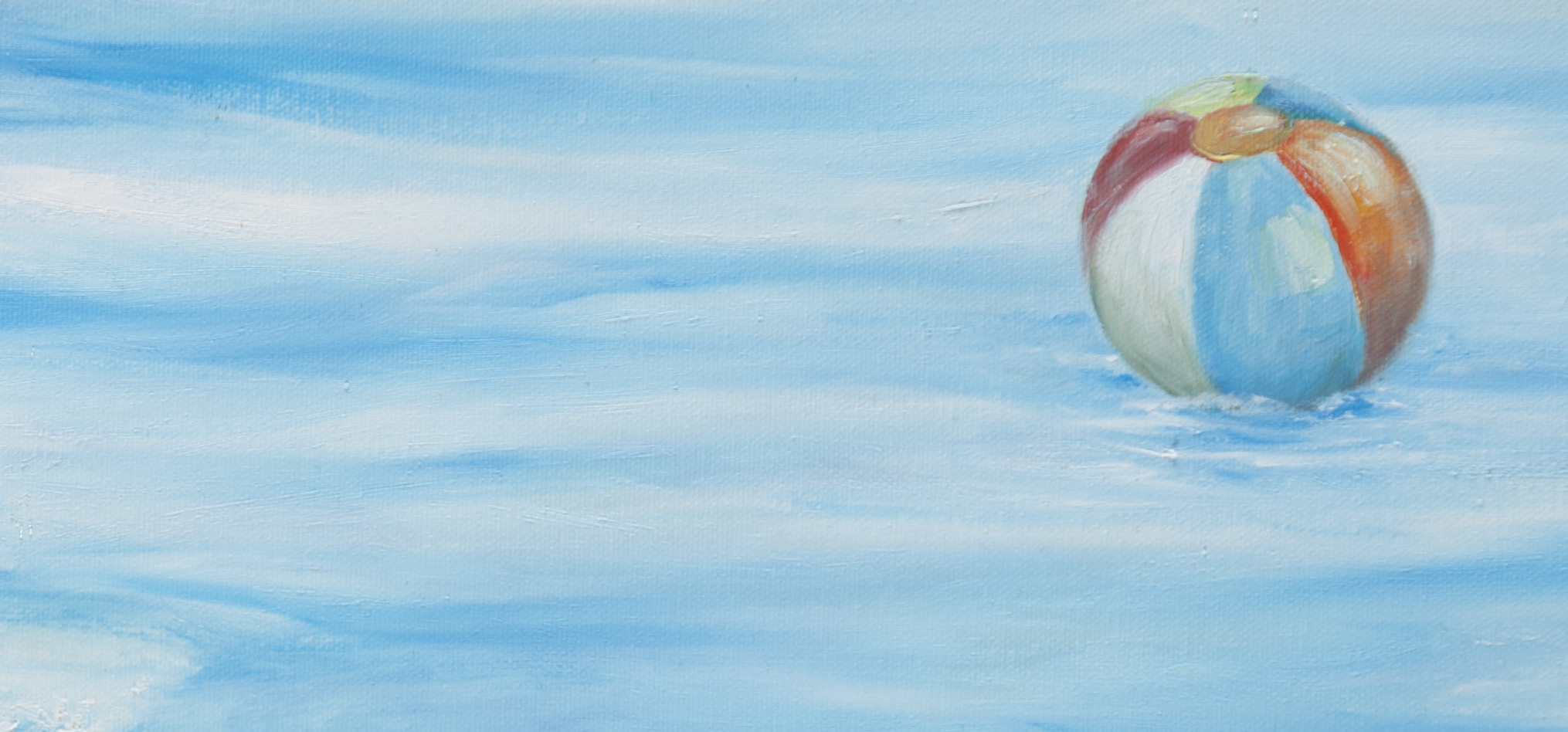 Beach ball floating on water.jpg