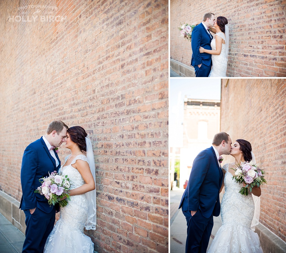 couple with brick wall in Champaign
