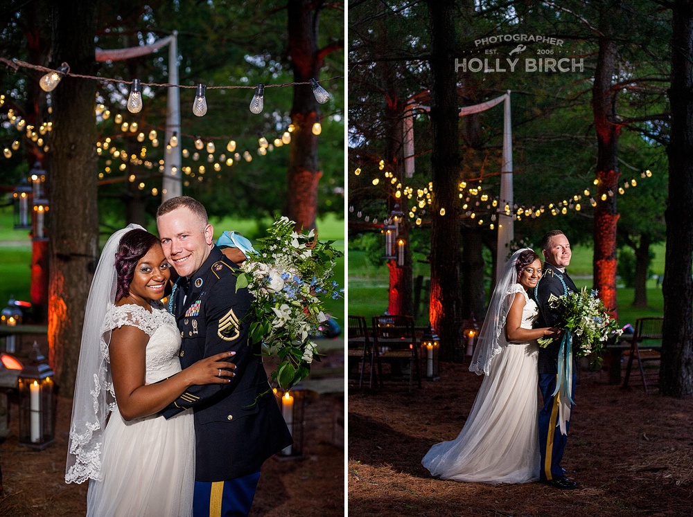 bride and groom pose with tall evergreen trees