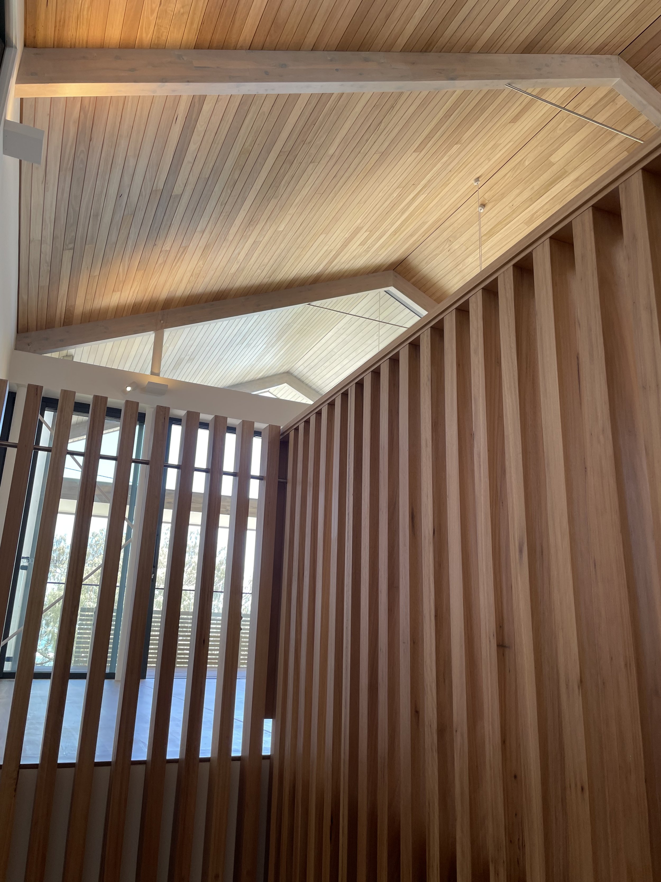 moffat-beach-house-exposed-rafters-messmate-ceiling-blackbutt-balustrade.JPG