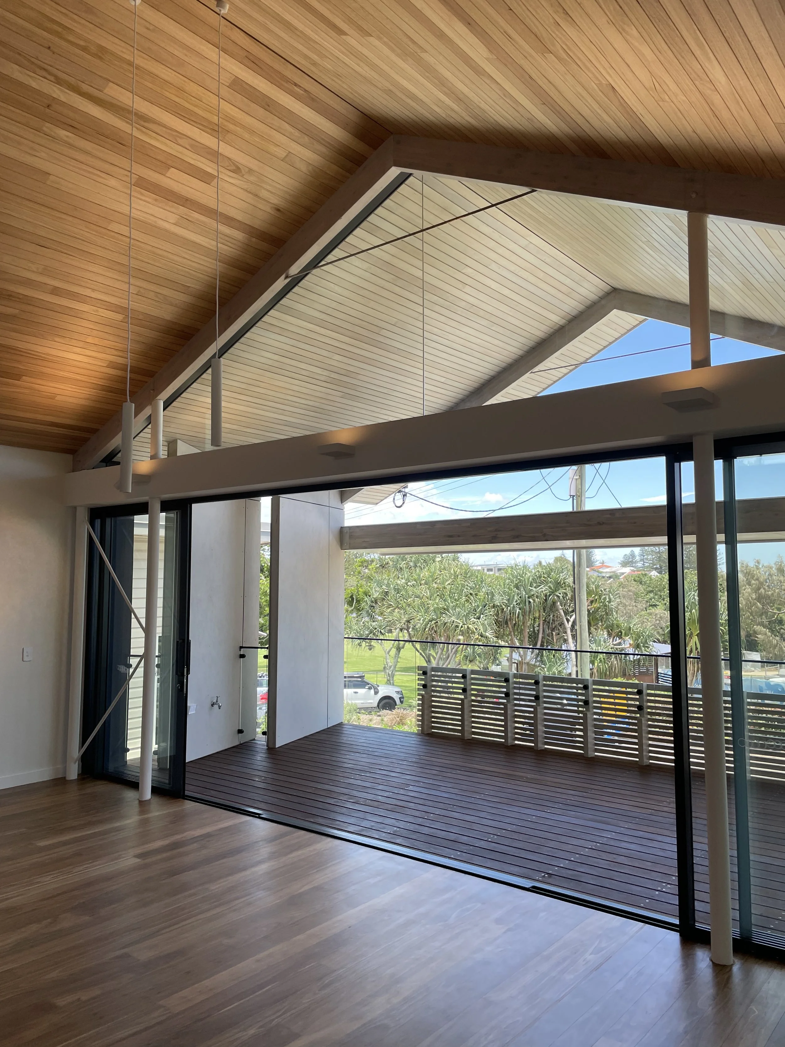 moffat-beach-sunshine-coast-beach-house-raked-hardwood-ceiling-glazed-gable-privacy-screens.JPG
