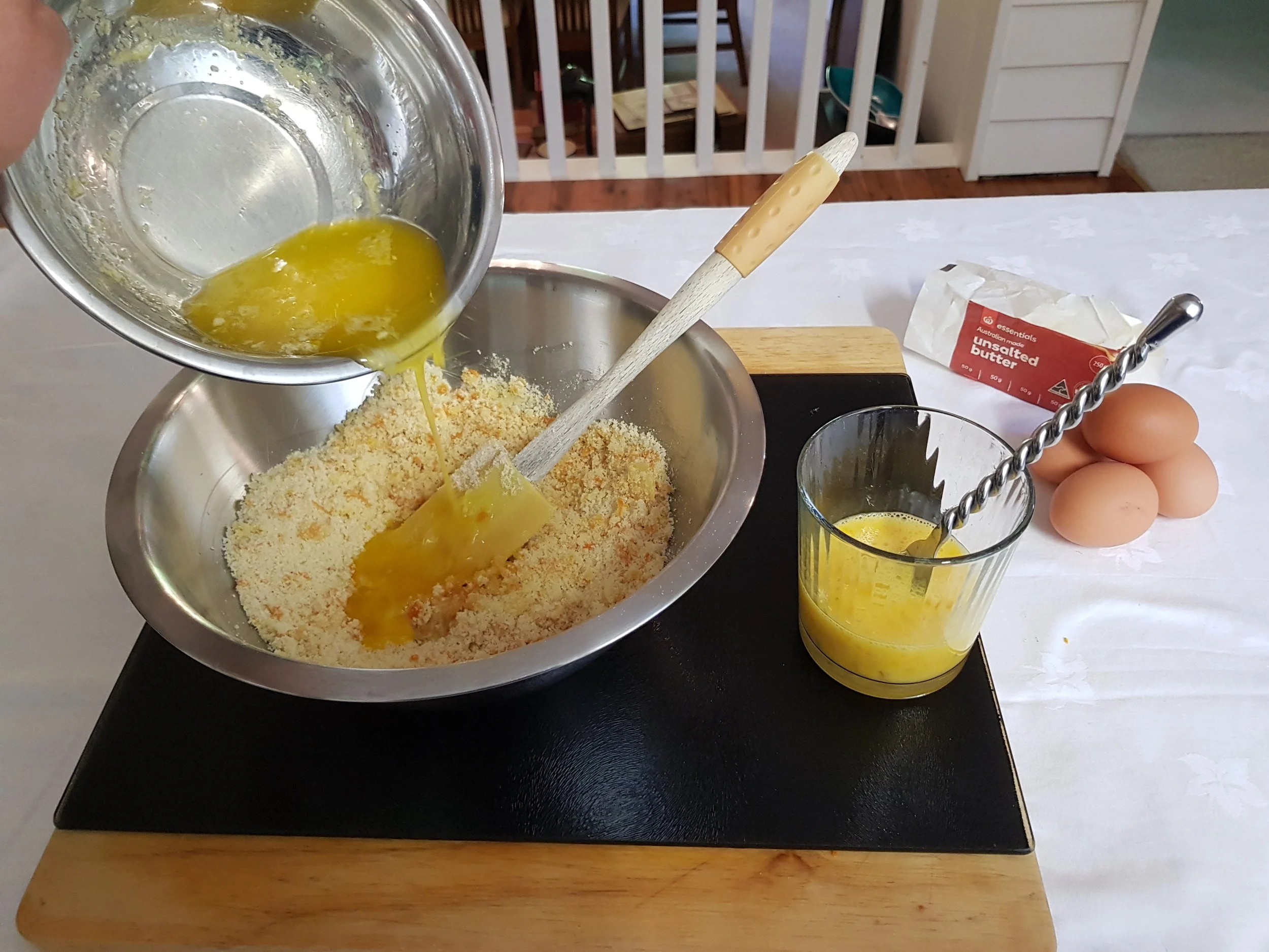 Step 5: Add the cooled melted butter and 2 beaten eggs