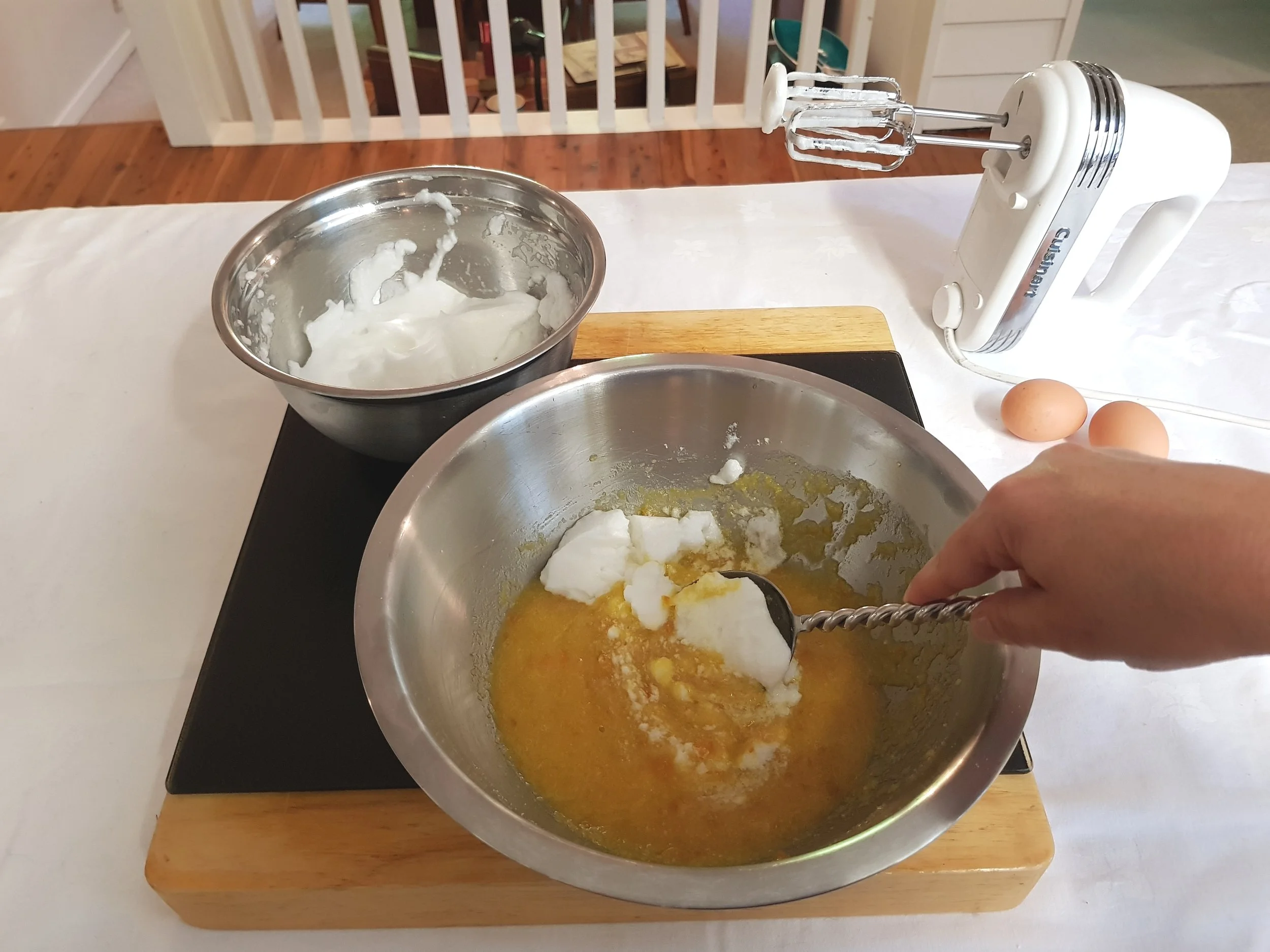 Step 6: Whisk 2 eggs whites and fold into the orange almond mixture