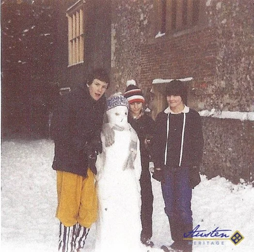 My daughter Caroline (on the right), building a snowman with neighbours
