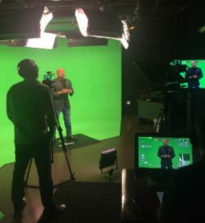 This is highly intriguing. The glowing green background. The professional studio. Daymond in action. It looks like the real deal!