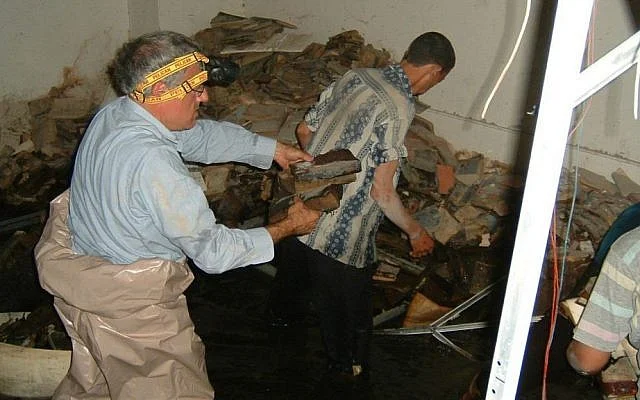 The Iraqi Jewish Archive in the basement of Iraq’s intelligence headquarters. Photo credit: Times of Israel (Harold Rhode, Courtesy of the US National Archives).
