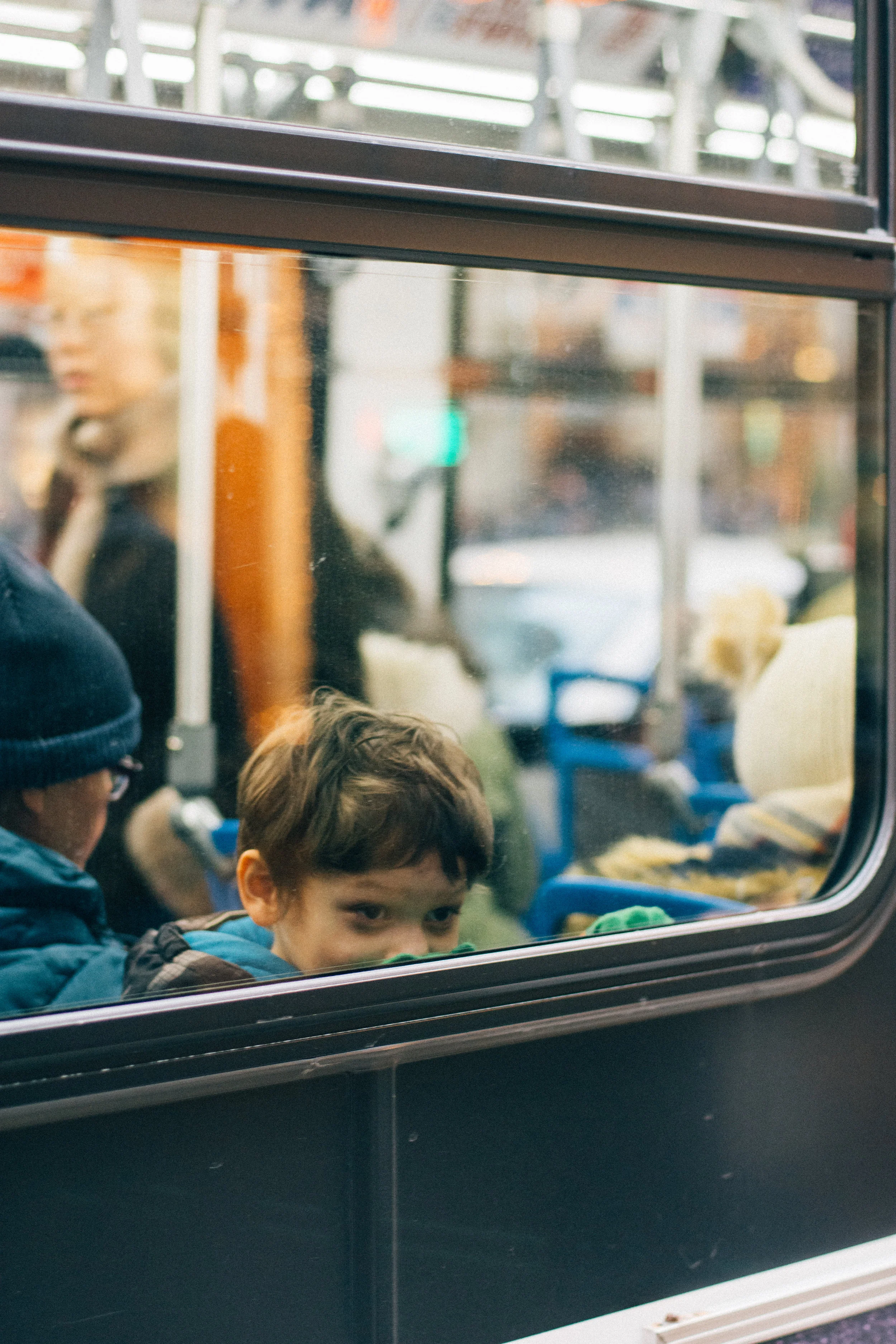 boy in bus through window portrait_.jpg