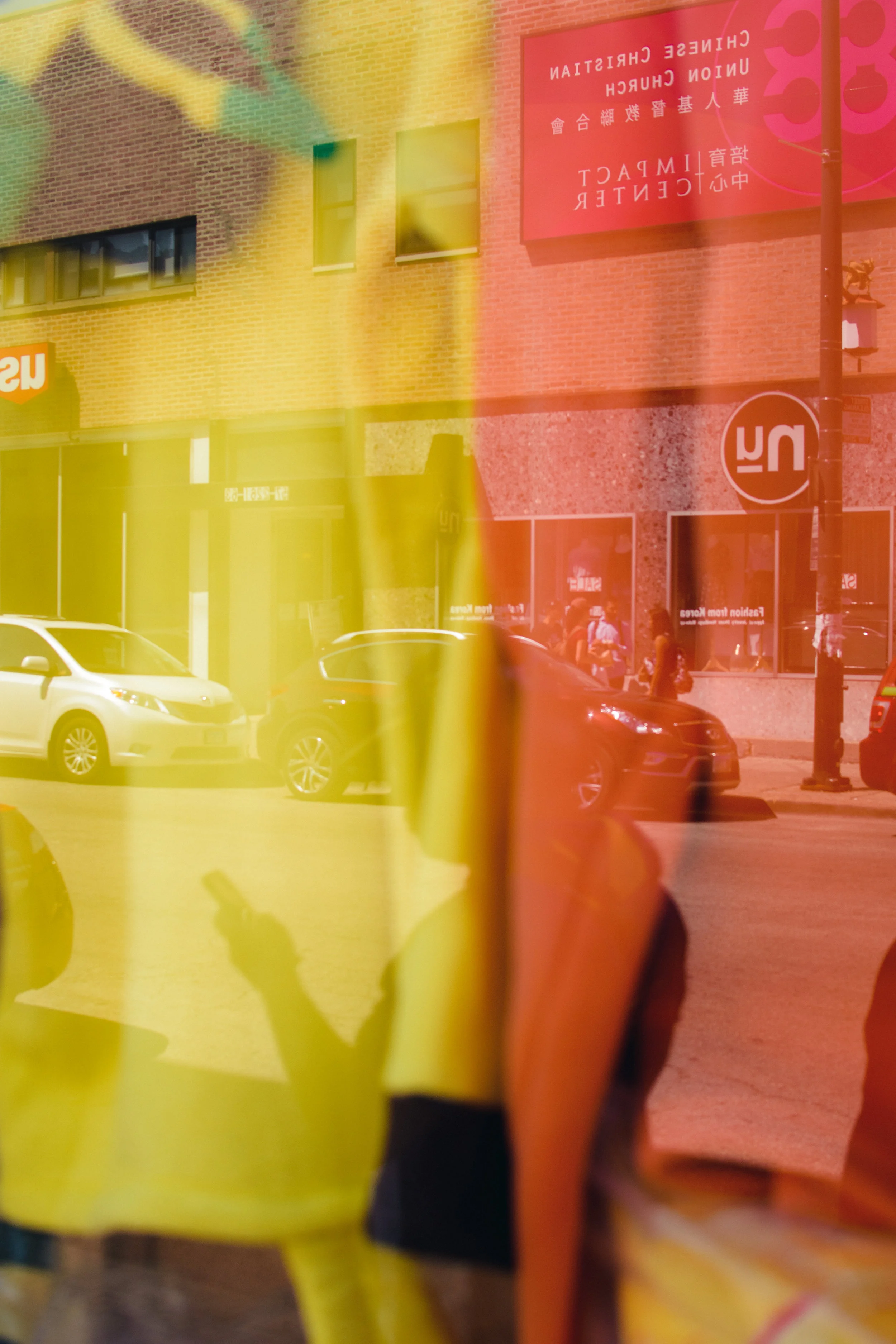 chinatown reflection red yellow on phone.jpg