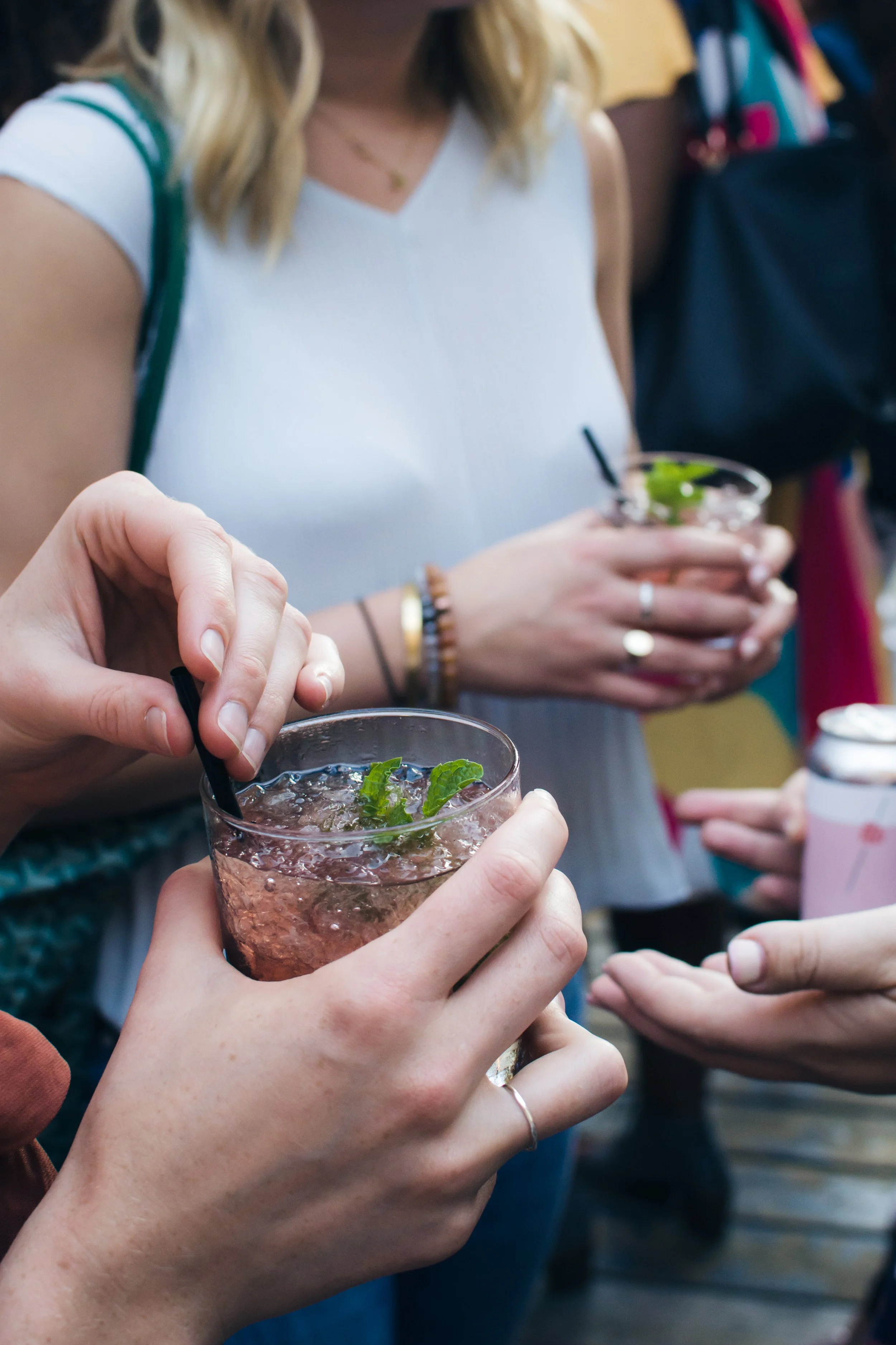 cocktail in hand stirring.jpg
