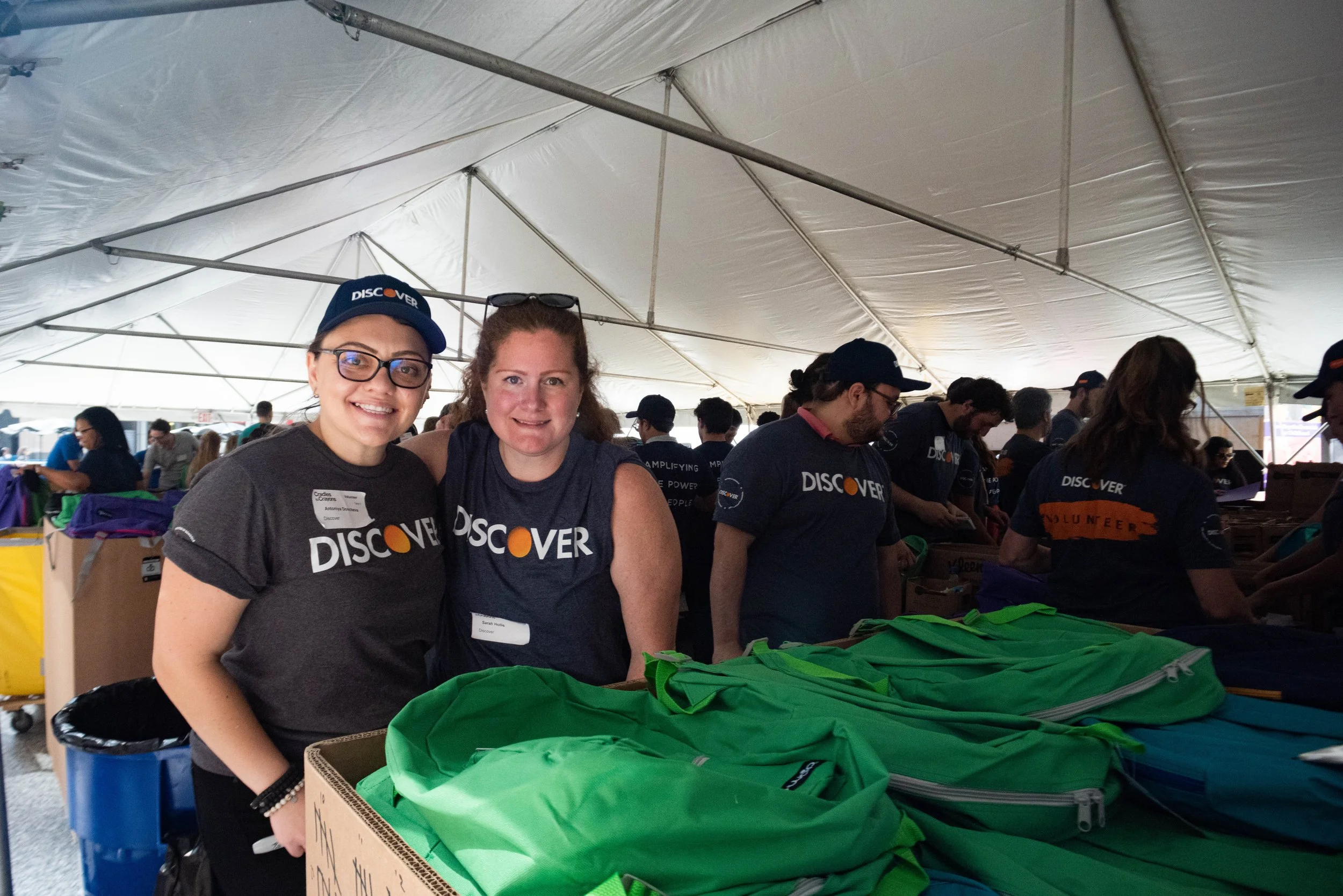 Discover Friends Posing Near Backpacks.jpg