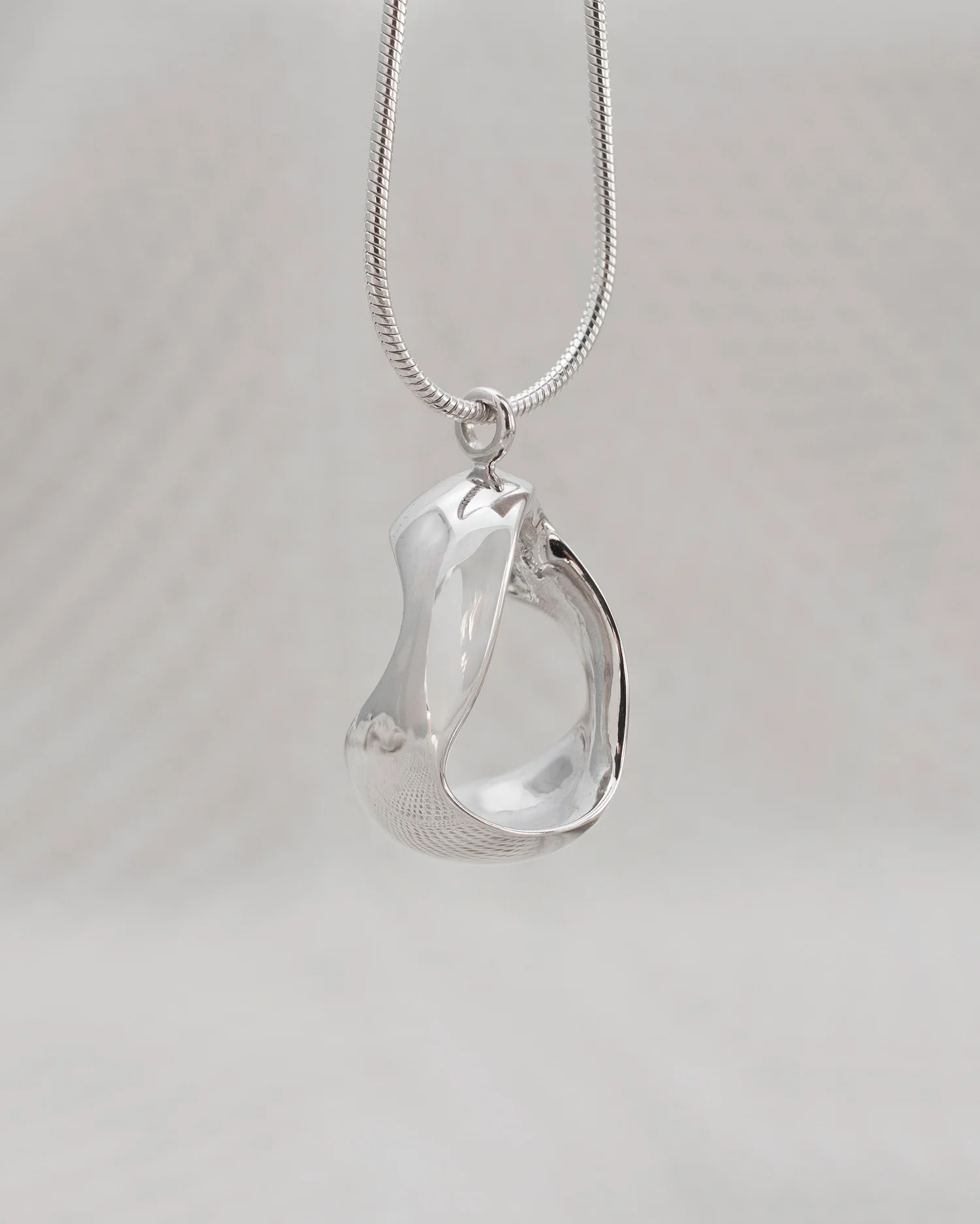Cradle Pendant sterling silver back view showing form