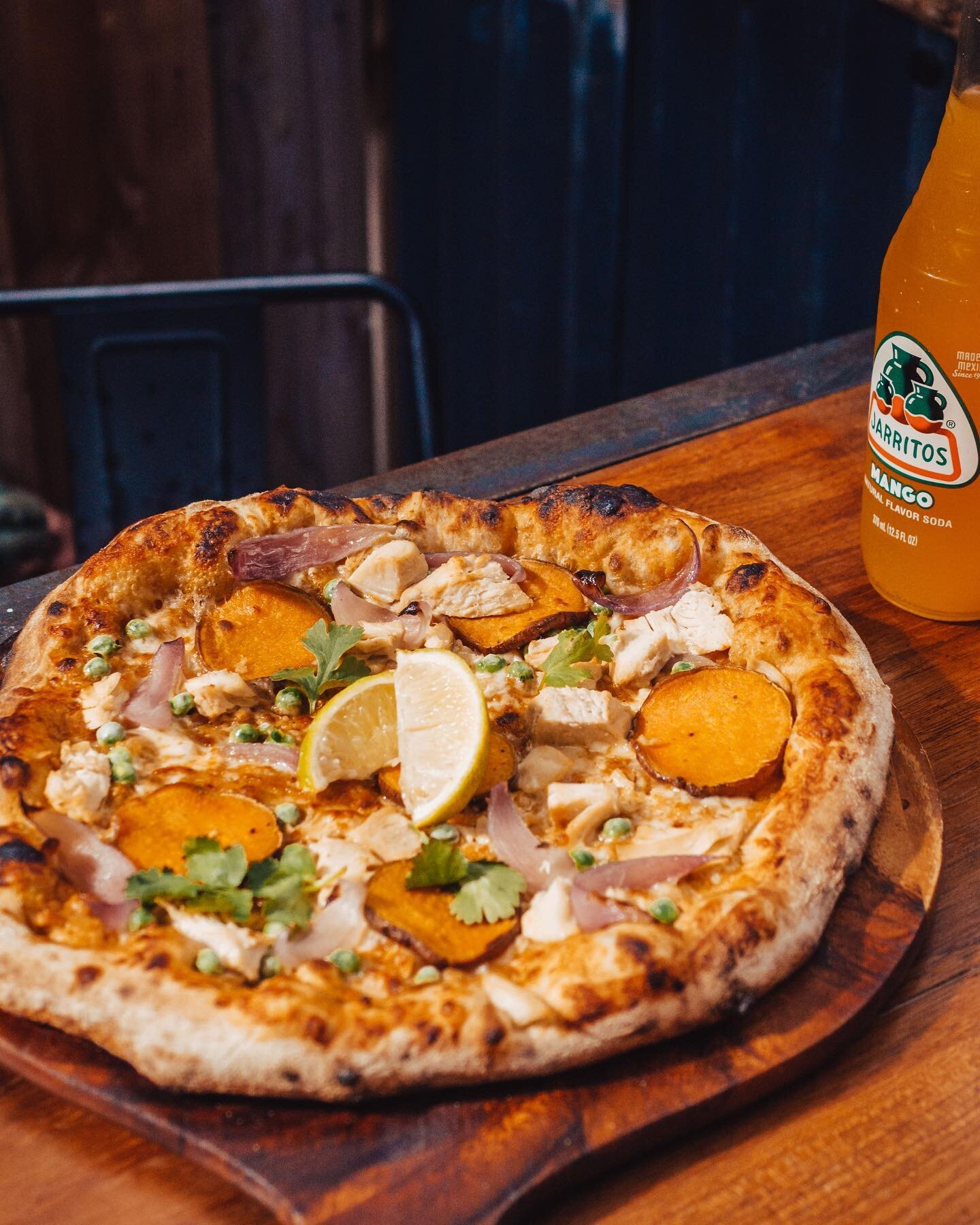 Something a bit different for this week&rsquo;s pizza special. Peanut satay sauce base topped with chicken, roasted sweet potatoes, roasted red onion, green peas &amp; coriander 🔥