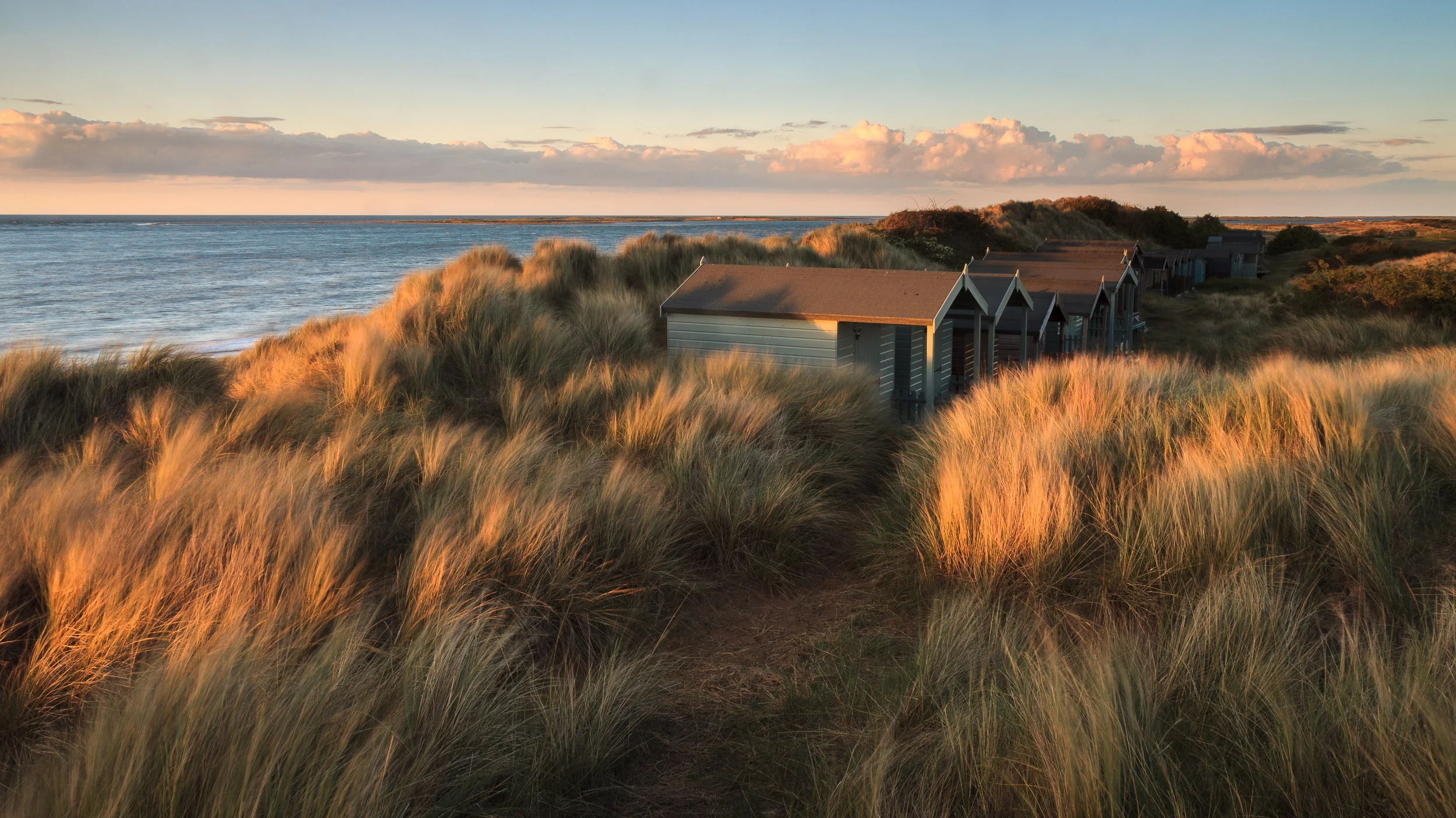 Beach huts in the dunes Brancaster, Norfolk