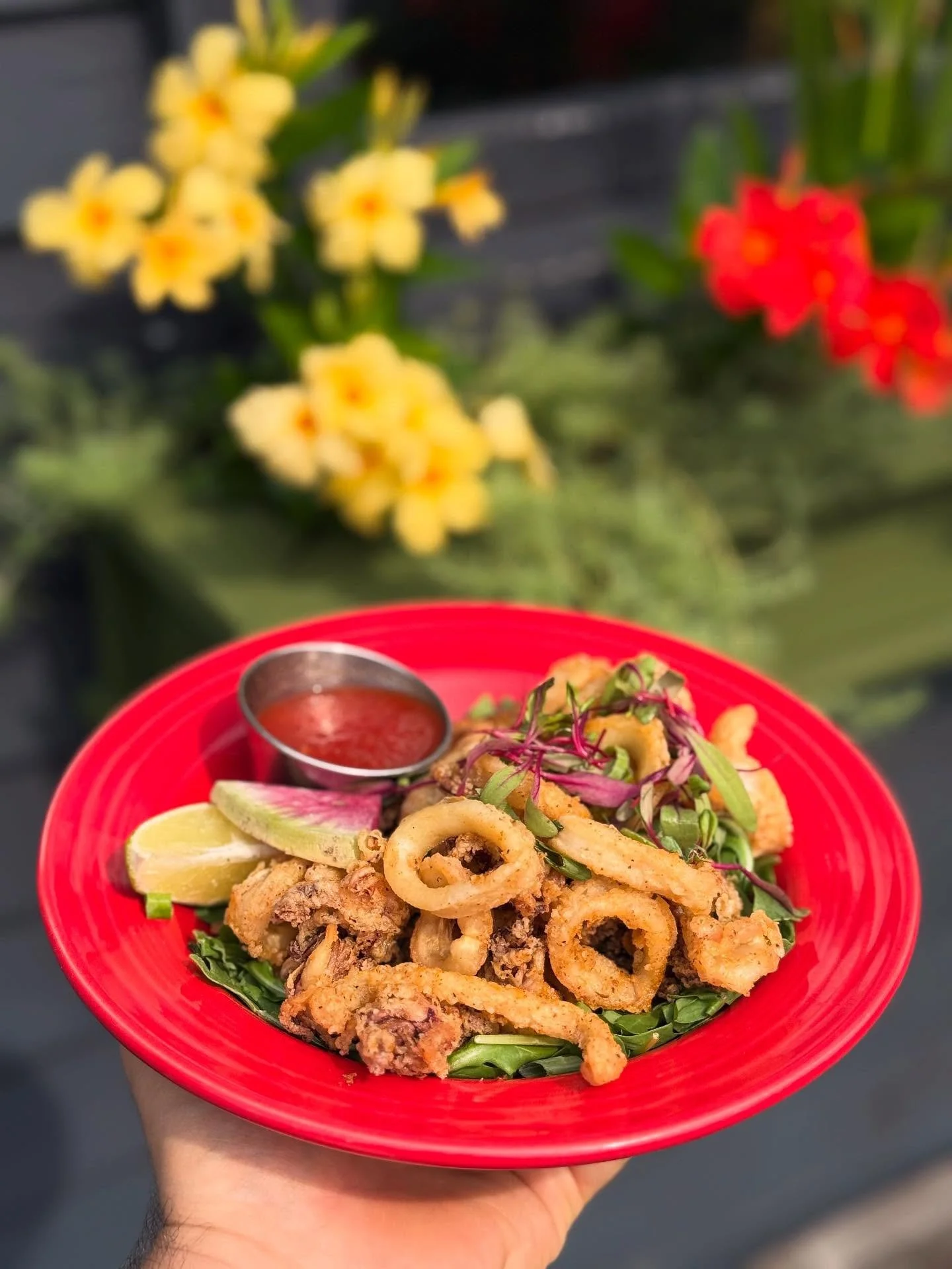 Tonight&rsquo;s special - Crispy Fried Calamari nestled on a bed of peppery arugula, with a bright Tomato-Red Pepper Chili Jam.