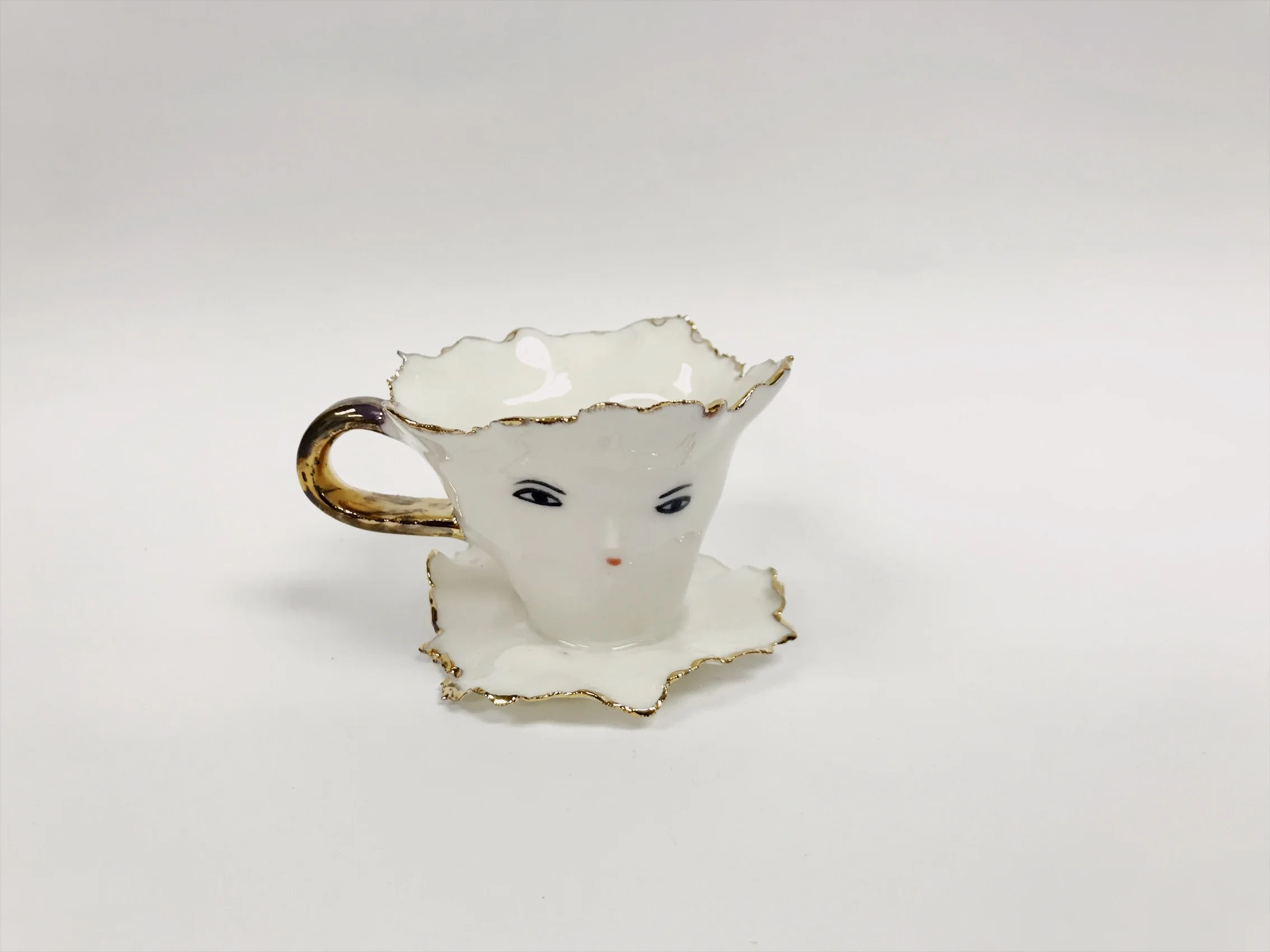 Ballerina with golden edges and handle