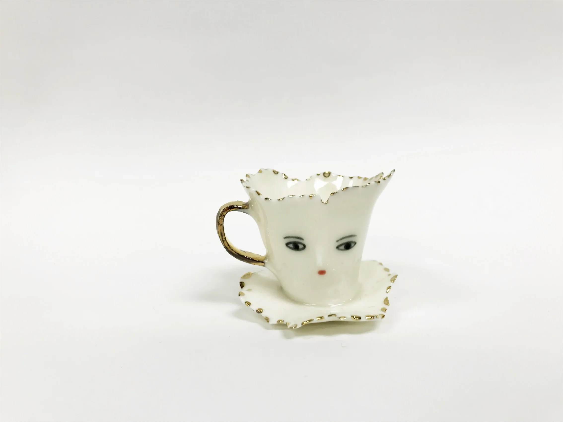 Mini Ballerina with golden handle and dotted edges