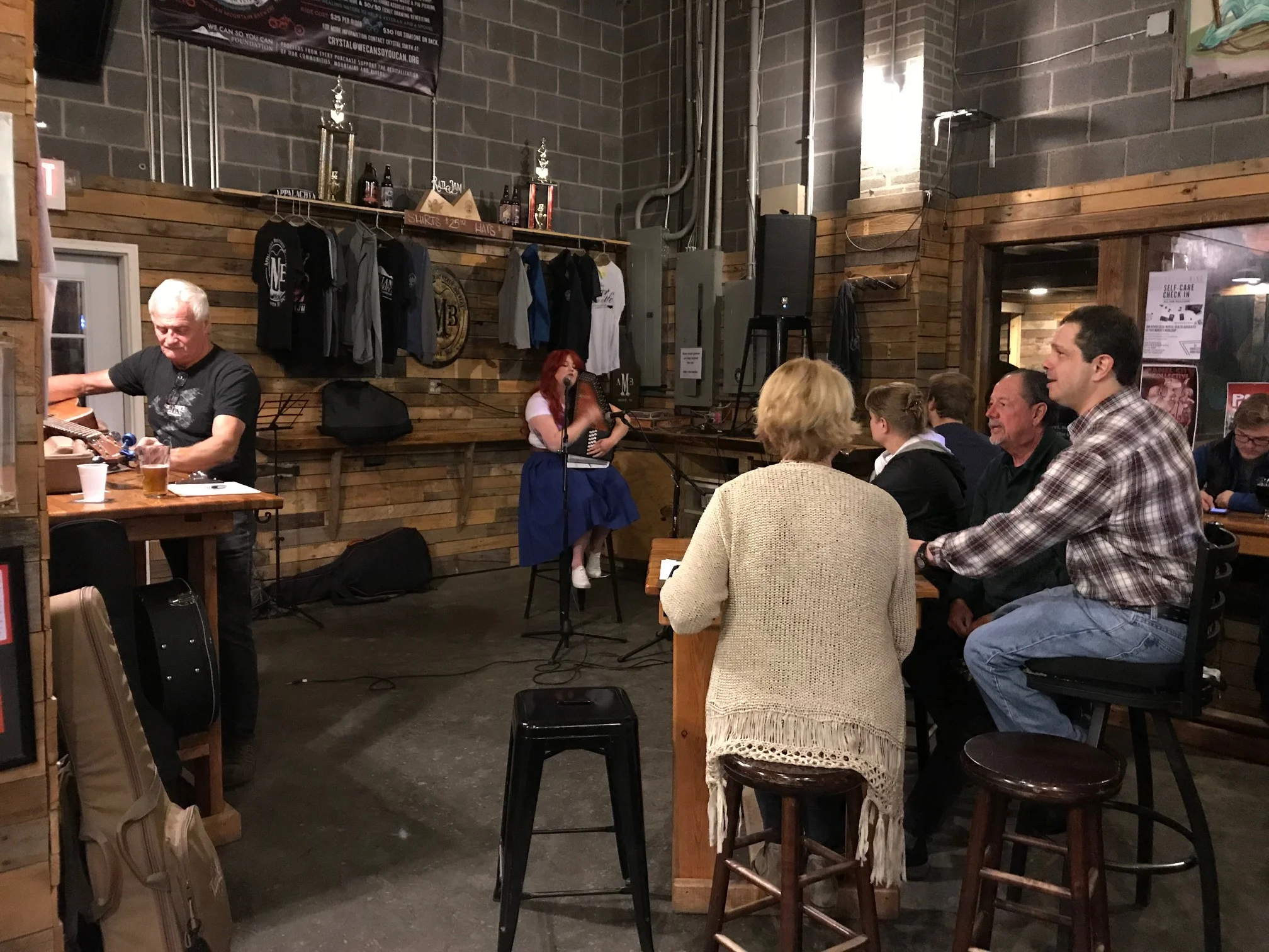 Annie doing her Ariel-impression and song at open mic night at AMB in Boone.