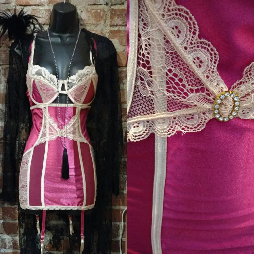 Corset in pink satin and white lace shown on a mannequin at VaVaVooom’s downtown Asheville lingerie store.