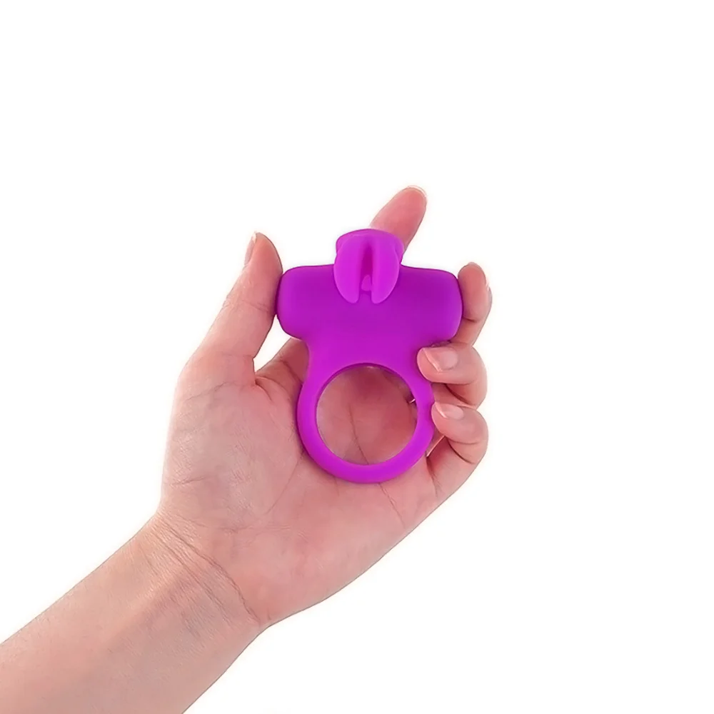 The VeDO Frisky Bunny, a cock ring with vibrating bunny-shaped head from VaVaVooom's curated selection of body-safe sex toys. Shown in purple held in a person's hand.