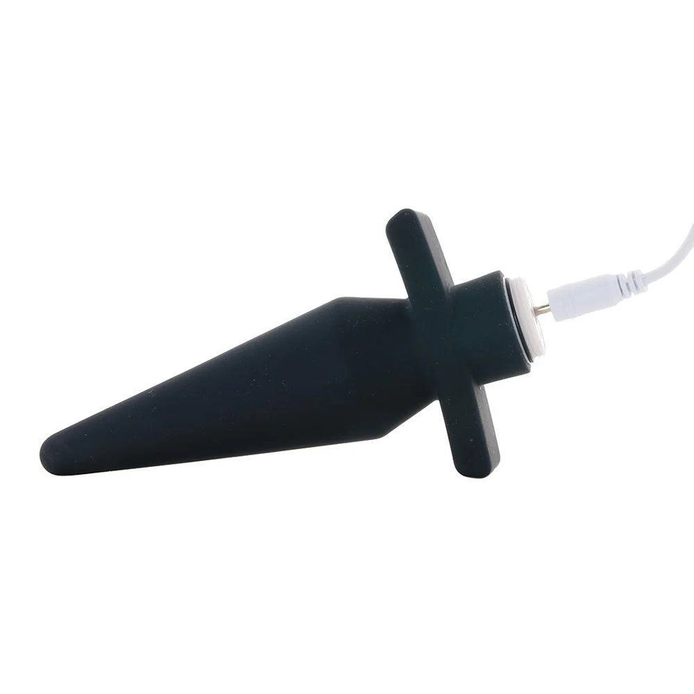 The VeDO Rio, a vibrating butt plug from VaVaVooom's curated selection of anal sex toys. Shown plugged in to it's charging cord.