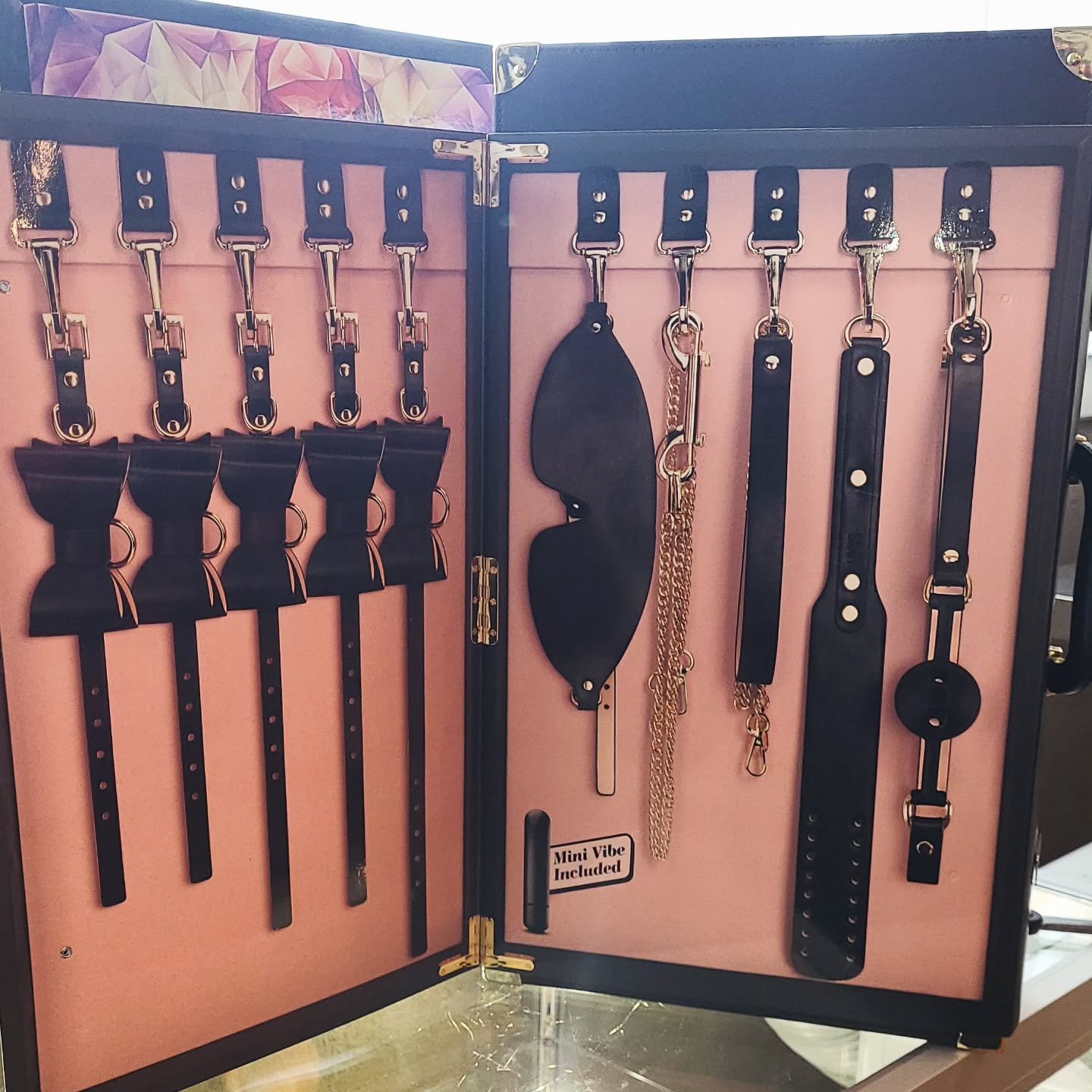 This is the Temptasia Safe Word all-in-one kit ⛓️
This beautiful yet sturdy suitcase contains everything you need to take your escapades on the road 🧳
But what all is inside?? 🤔
✨️Blindfold 
✨️Ankle &amp; Wrist Restraints 
✨️Collar and Leash
✨️Brea