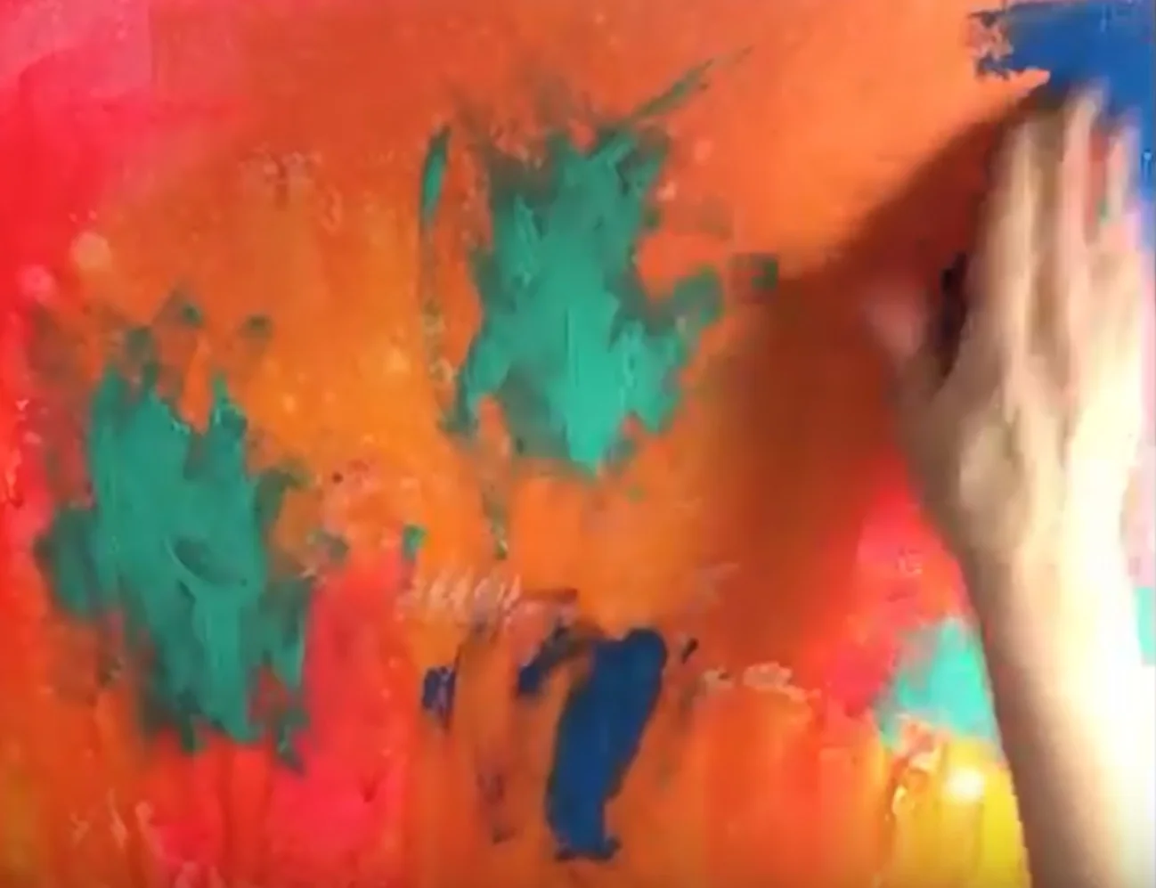 Early stage of painting without brushes and only hands