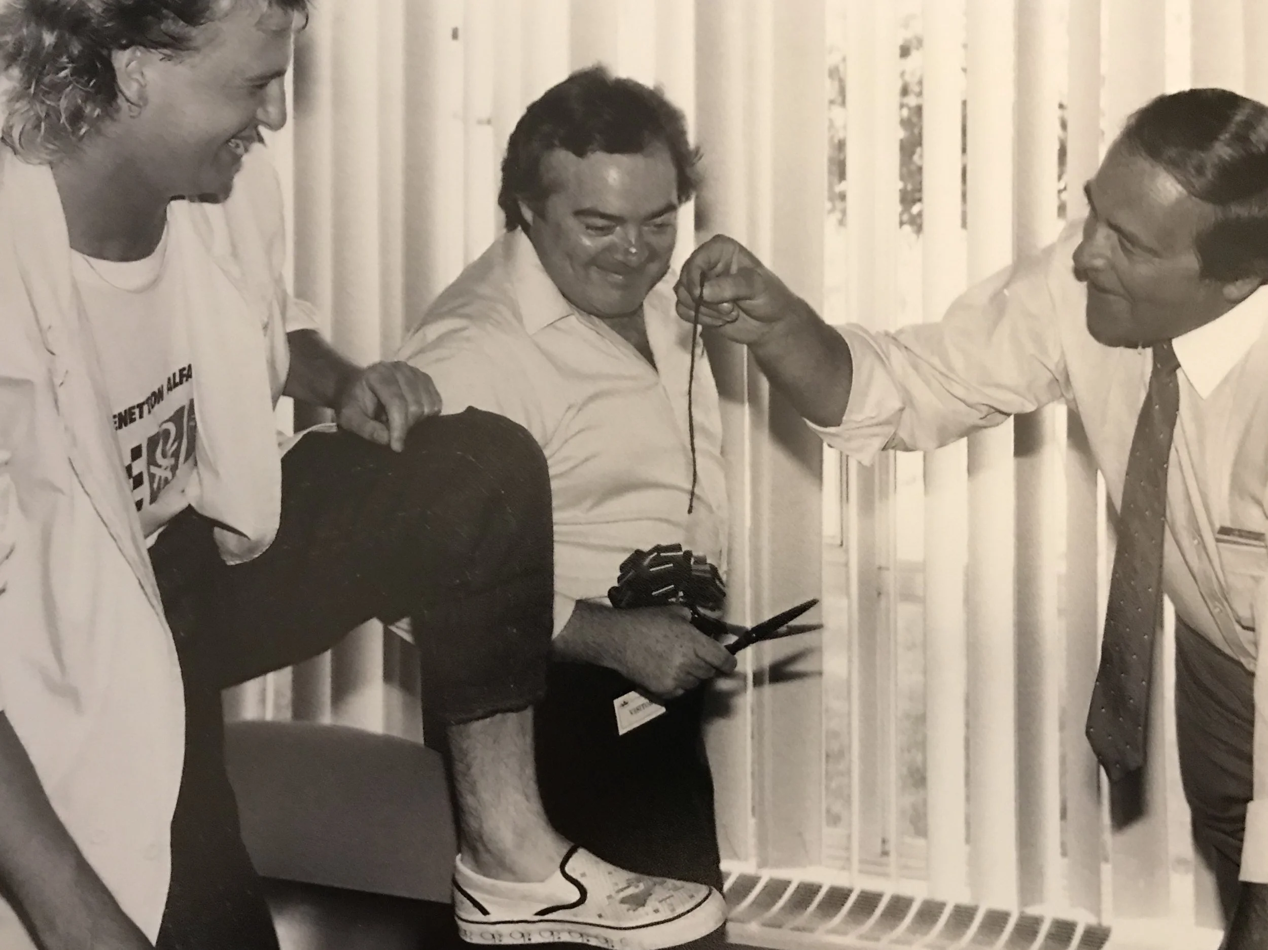 EMI President, David Evans, cuts off my “protest” anklet.
