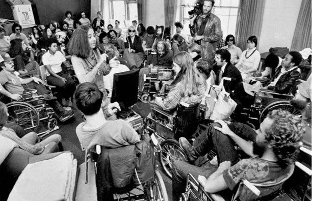 For 25 days in April 1977, a group of roughly 150 disability rights activists took over the fourth floor of a federal building in San Francisco. They would not leave, they said, until President Jimmy Carter's administration agreed to implement a four