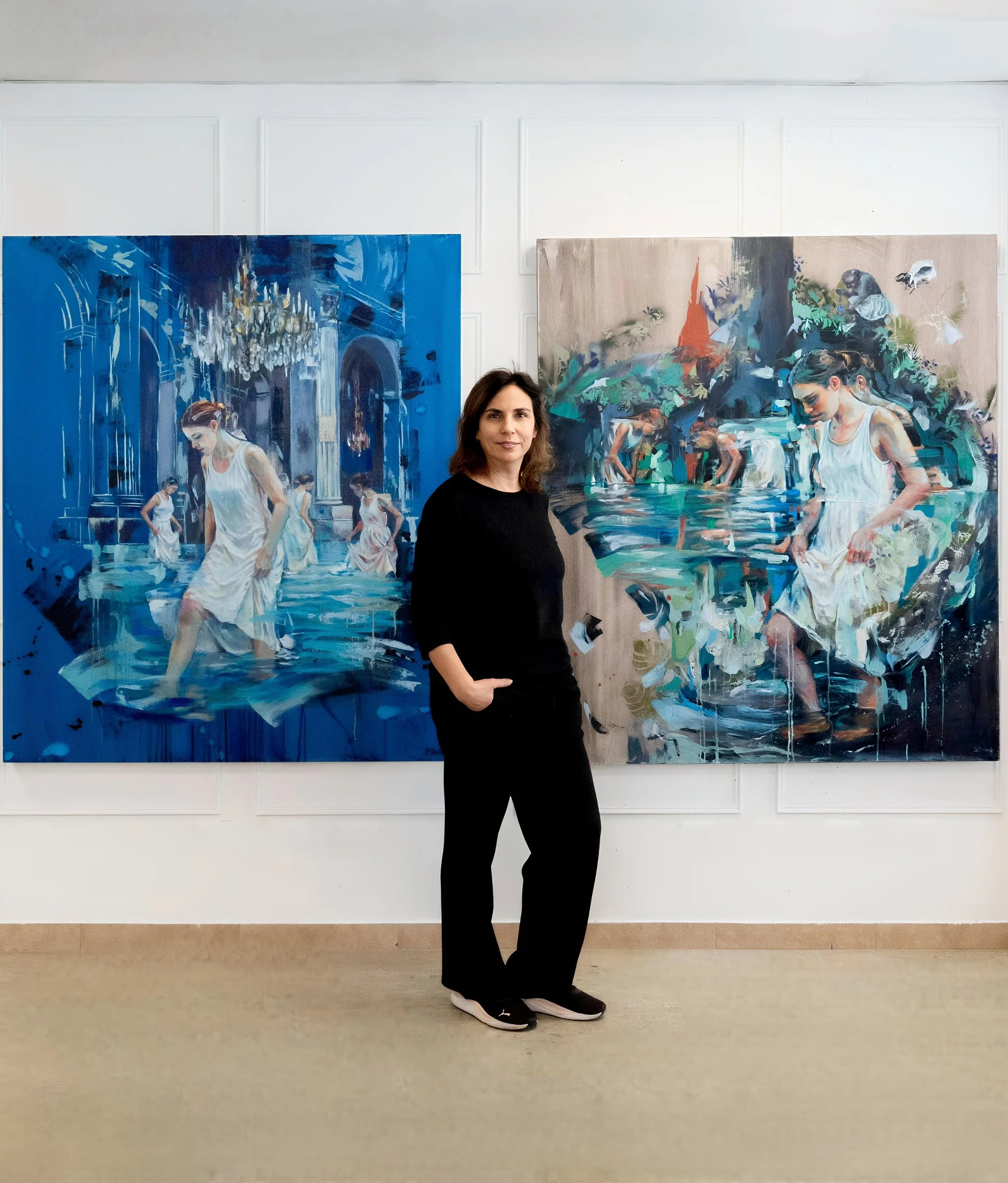 Peruvian figurative artist Daniella Queirolo with two paintings from her new Art on Art series.