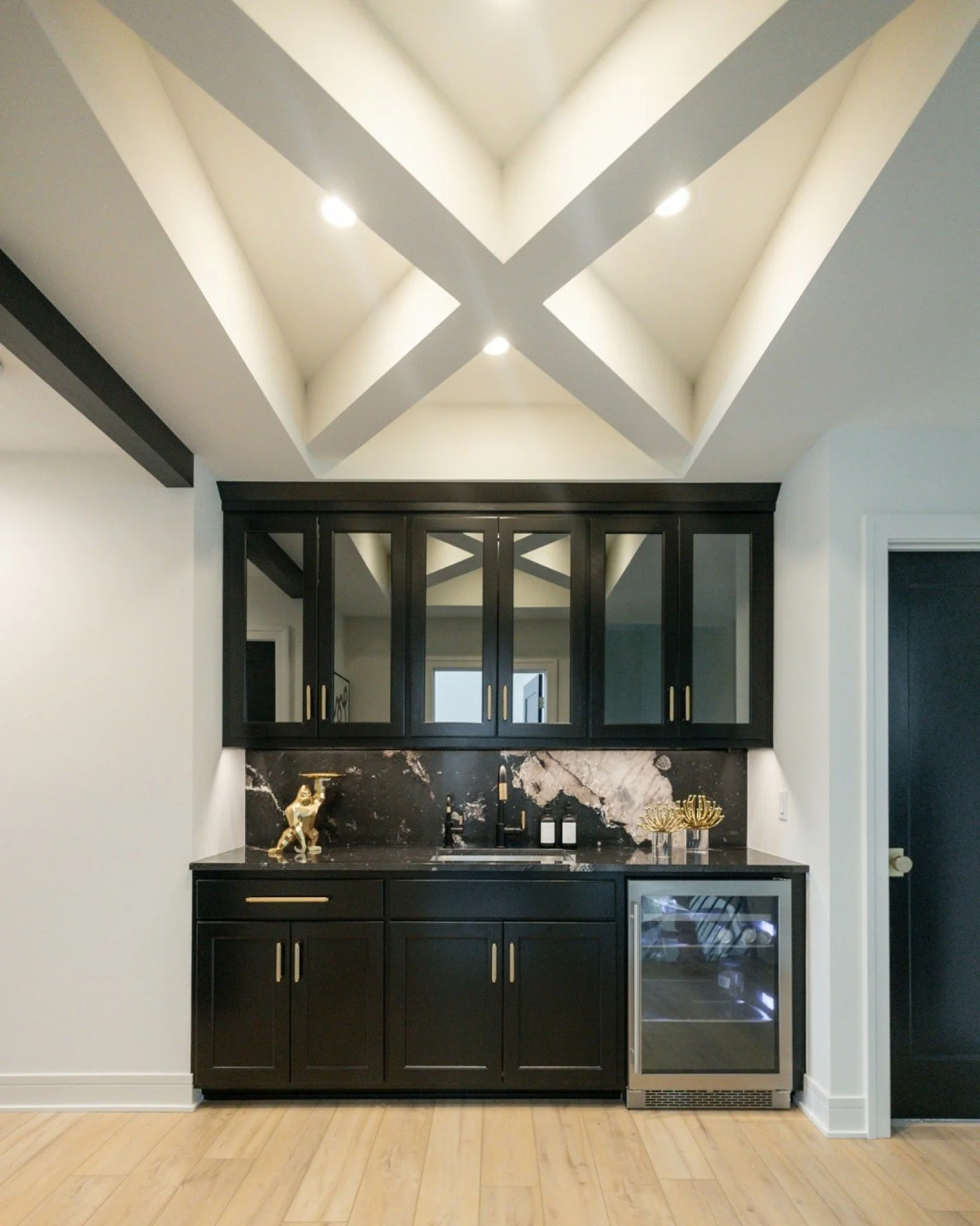 Hallway? More like happy hour way. 🍷 This upstairs wet bar makes every pass-by worth the pause.

#WAYSInteriors 
#HomeBarDesign 
#EntertainingInStyle 
#InteriorDesign 
#theWAYSway
#OmahaDesign