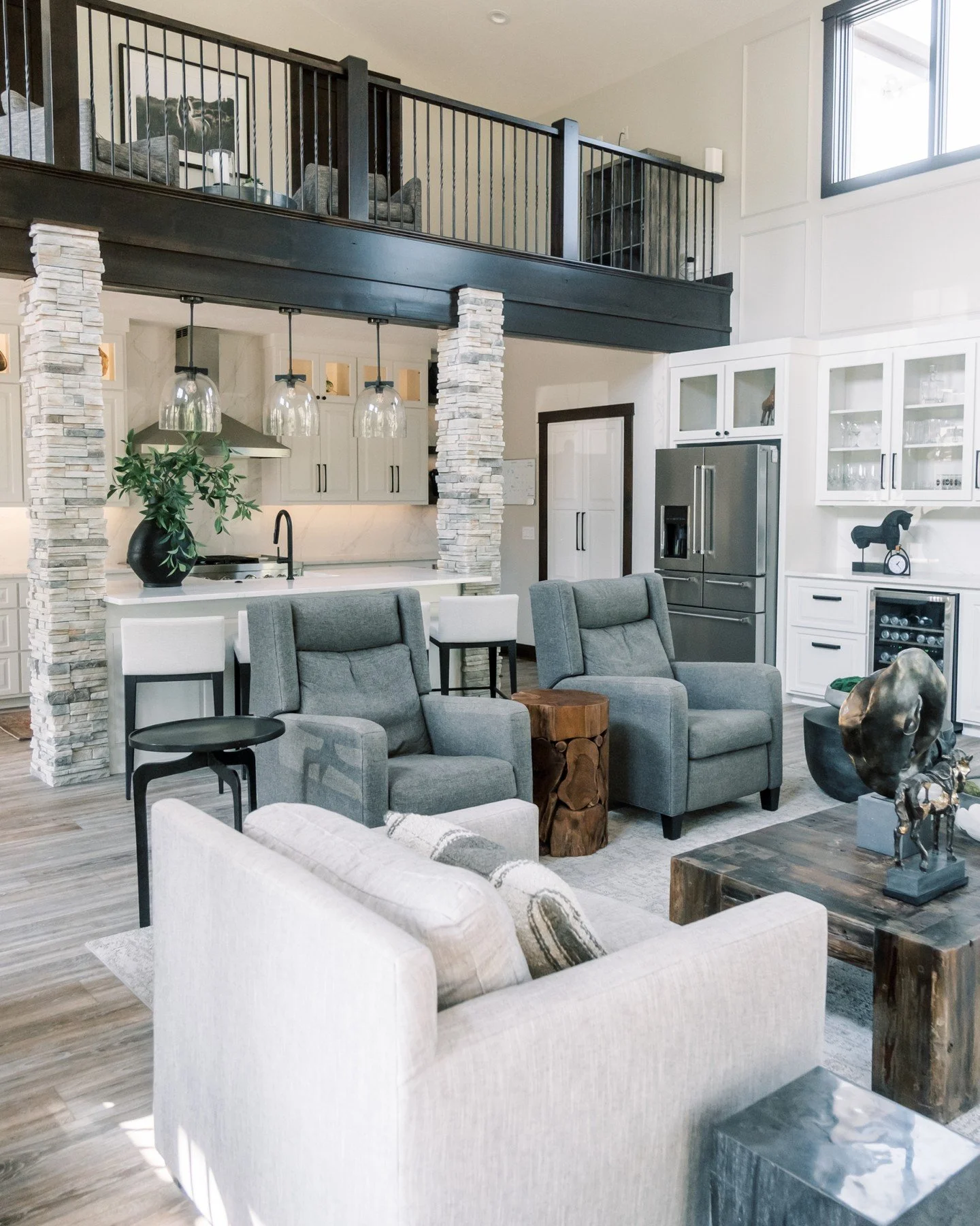 Swipe to see this transformation! From dark to bright and full of warmth &mdash; this remodel completely transformed the heart of the home. By bringing in fresh light and embracing rustic textures, we created a space that feels both elevated and invi