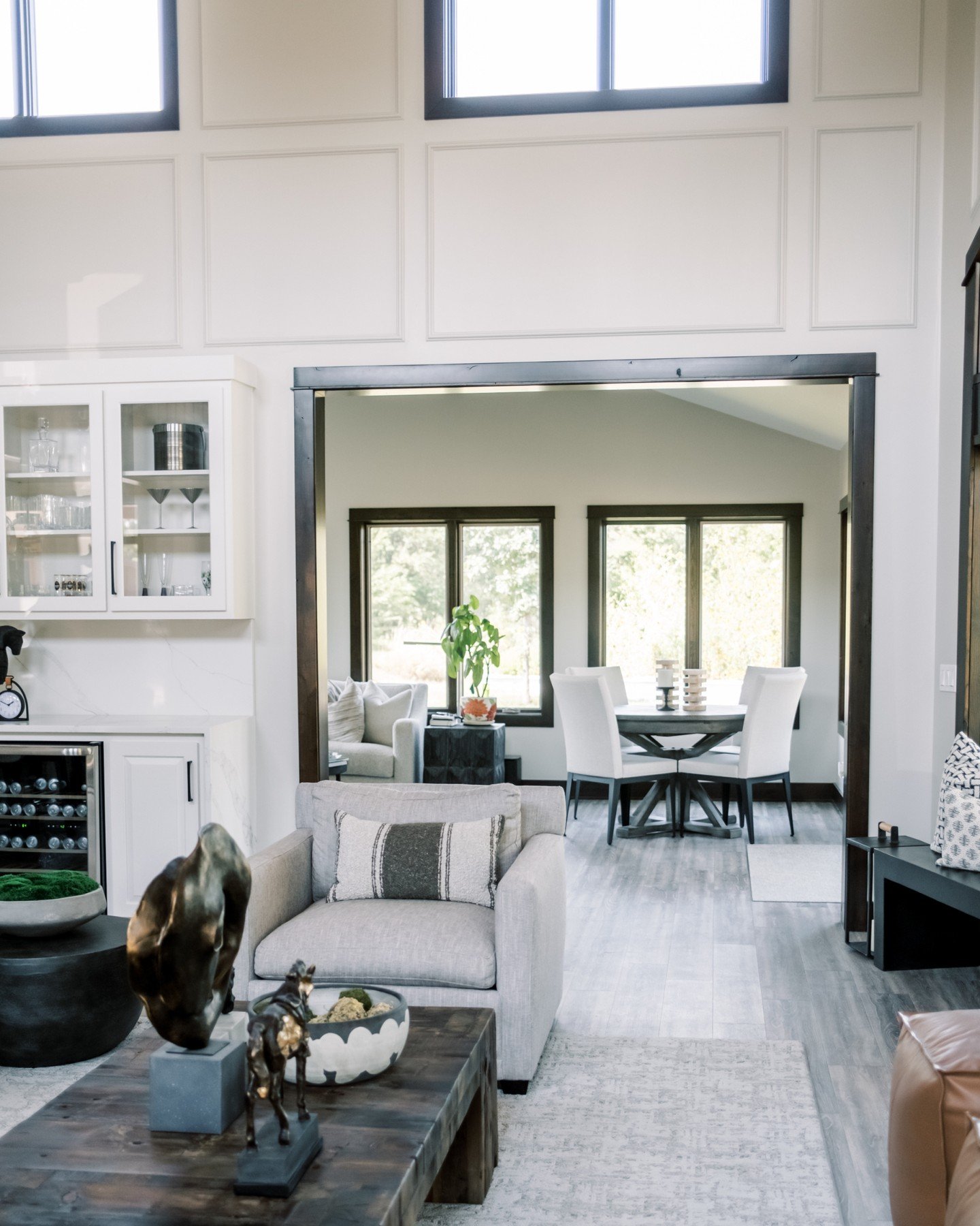 Loved the land.
Loved the home.
Needed more space.

This client expressed that they needed more space &mdash; so we designed a sunroom addition that flows seamlessly from the kitchen and living area, creating the perfect space for entertaining year-r