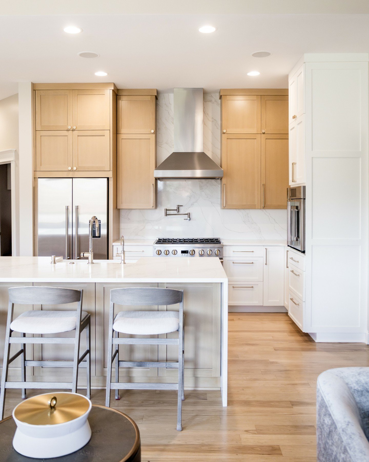 From classic to just a touch more current.

By replacing the white hood with stainless steel and refining the details, we gave this kitchen a fresh focal point while honoring its original charm.

An update that feels intentional, not overdone.
Swipe 