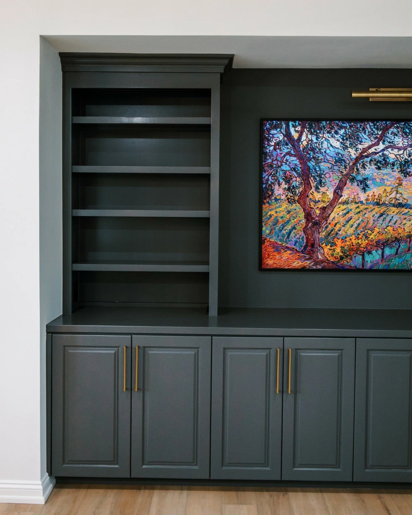 This wall = completely redefined ✨

✔️ Moody built-in for contrast + depth
✔️ Balanced symmetry to frame the TV
✔️ Closed storage (because real life)
✔️ Open shelving for styling moments

It&rsquo;s no longer just a media wall&mdash;it&rsquo;s the an