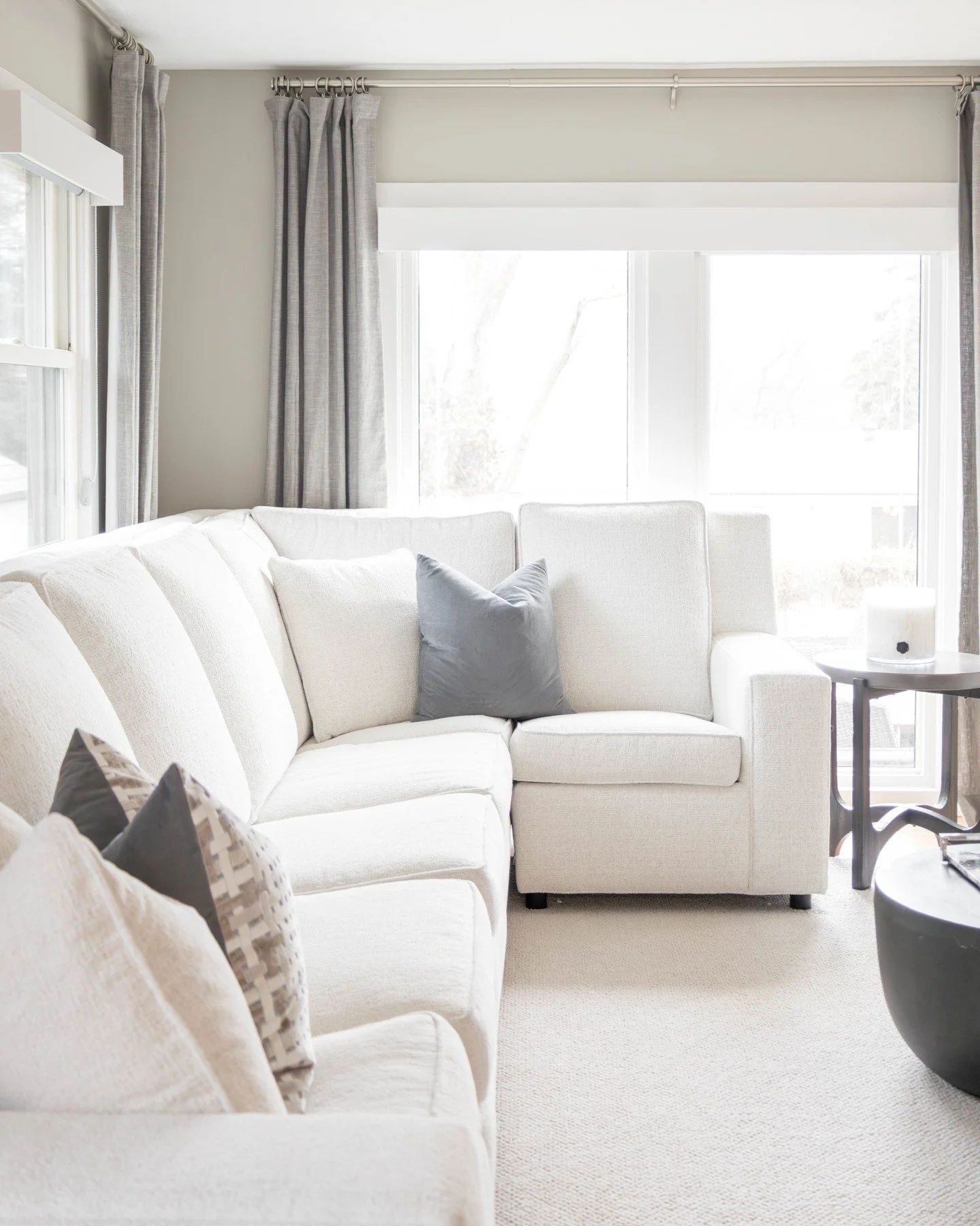 Layered neutrals, soft textures, and a sectional made for sinking in&mdash;this is the kind of spot that feels as good as it looks.

#WAYSInteriors
#InteriorInspo 
#CozyCorners 
#HomeStyling 
#theWAYSway