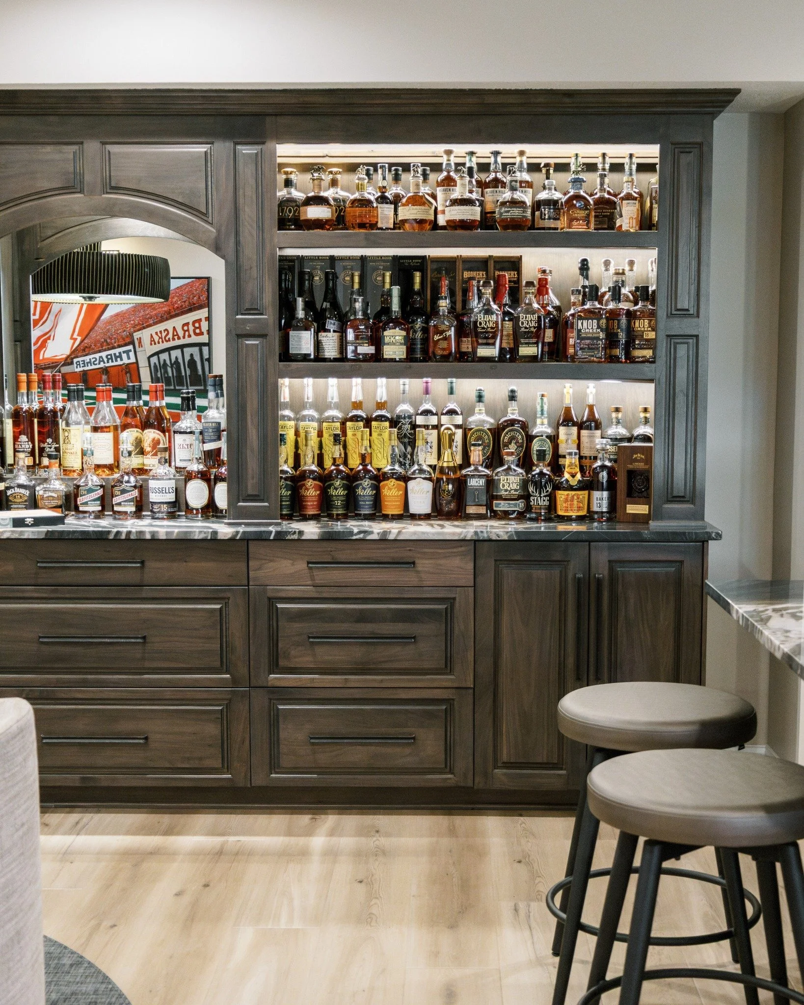 Where function meets a little bit of fun 🥃

This custom-built bourbon storage wall was designed to showcase our client&rsquo;s collection in a way that feels both elevated and intentional. Every detail, from the shelving layout to the lighting, was 