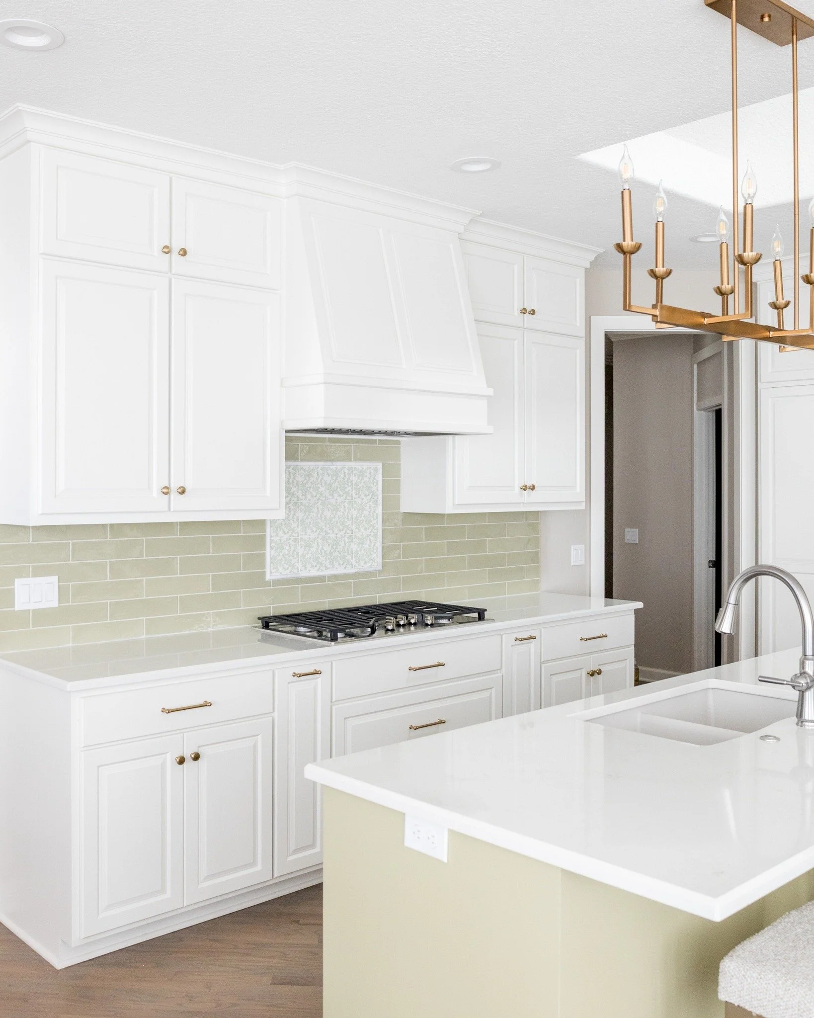 This is why we do what we do. 💚

This kitchen got a full glow-up and we are obsessed with how it turned out. A wall came down, the island was reimagined, and the fridge and range found their perfect spots. 

Our client loves green, and we made sure 