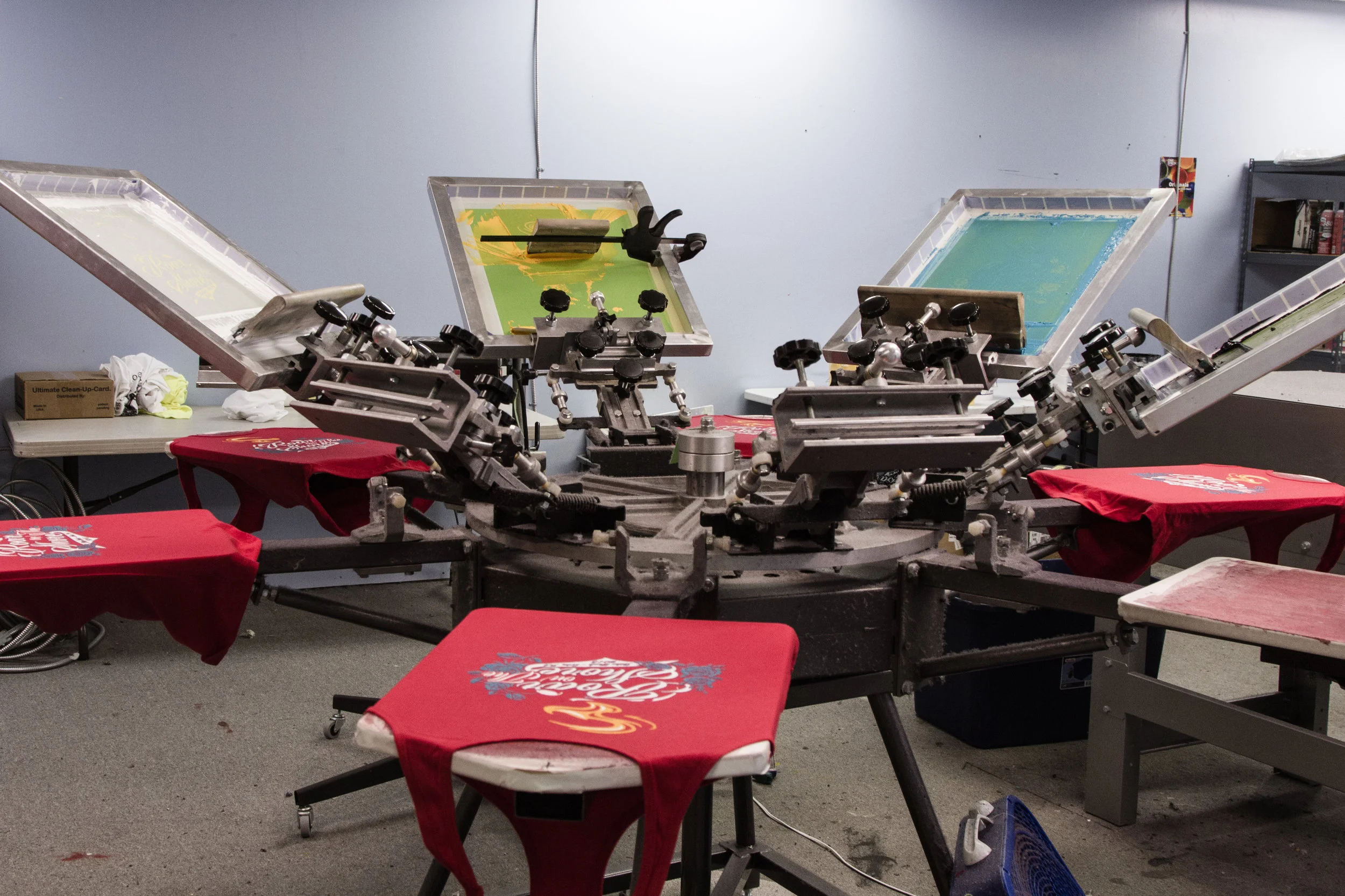 Inside the shop shirts are custom (and hand) screen printed, ready for this week's Roar on the Shore event. Iron Empire is the FIRST local screen printing company to land the Roar on the Shore account.