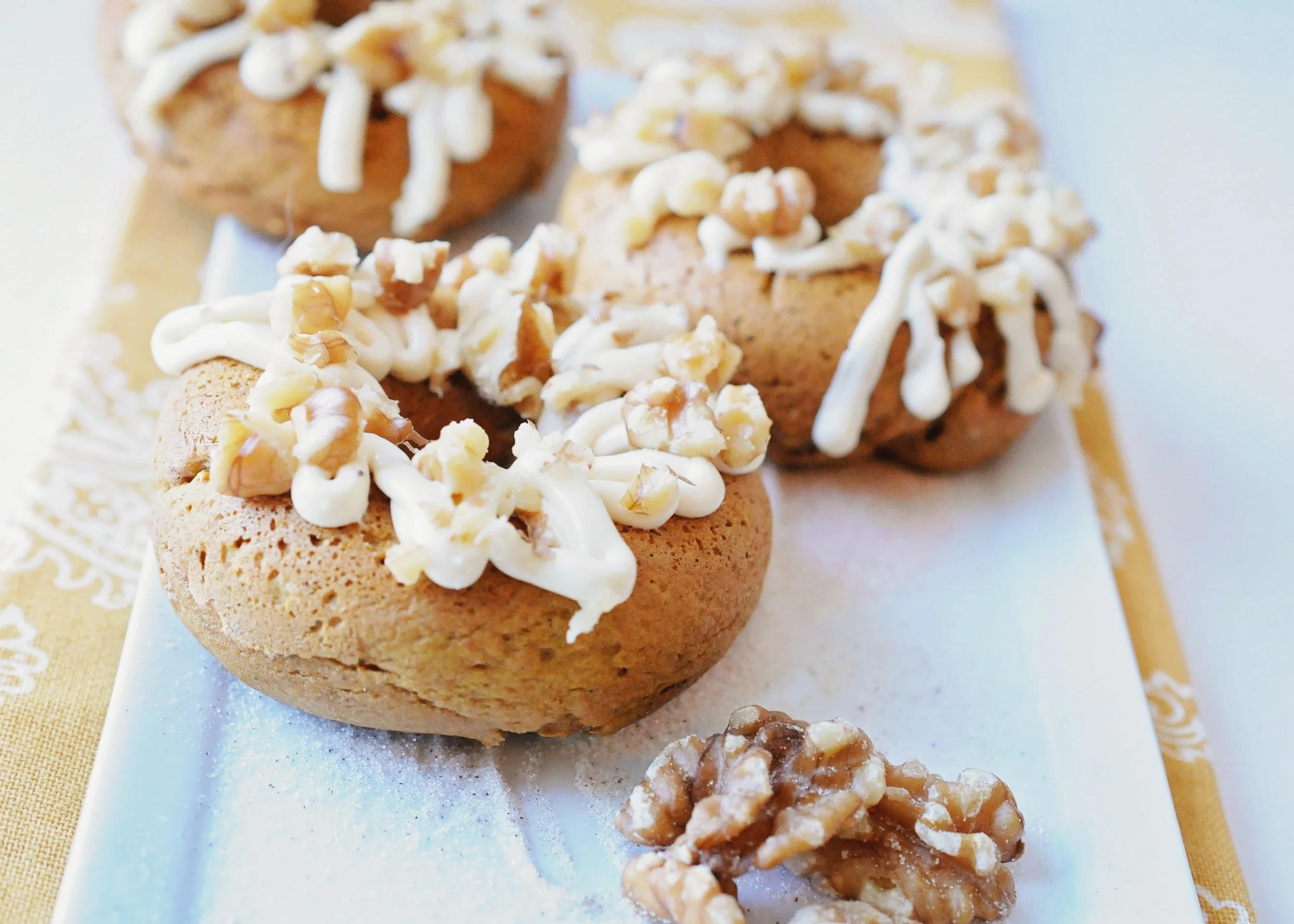 Pumpkin Spice Doughnuts with Maple Cream Cheese Glaze