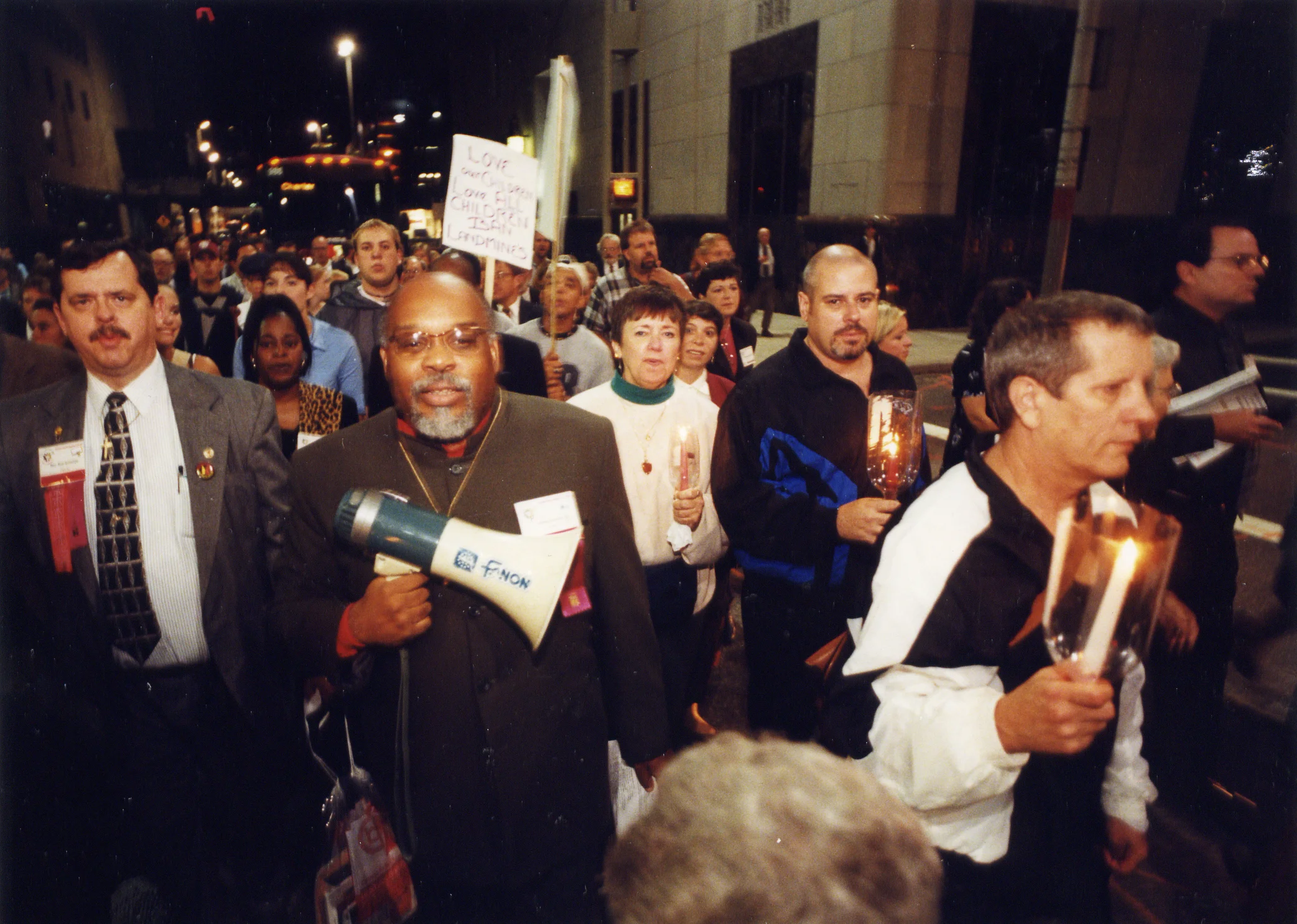 demus leading DJAN march.jpg