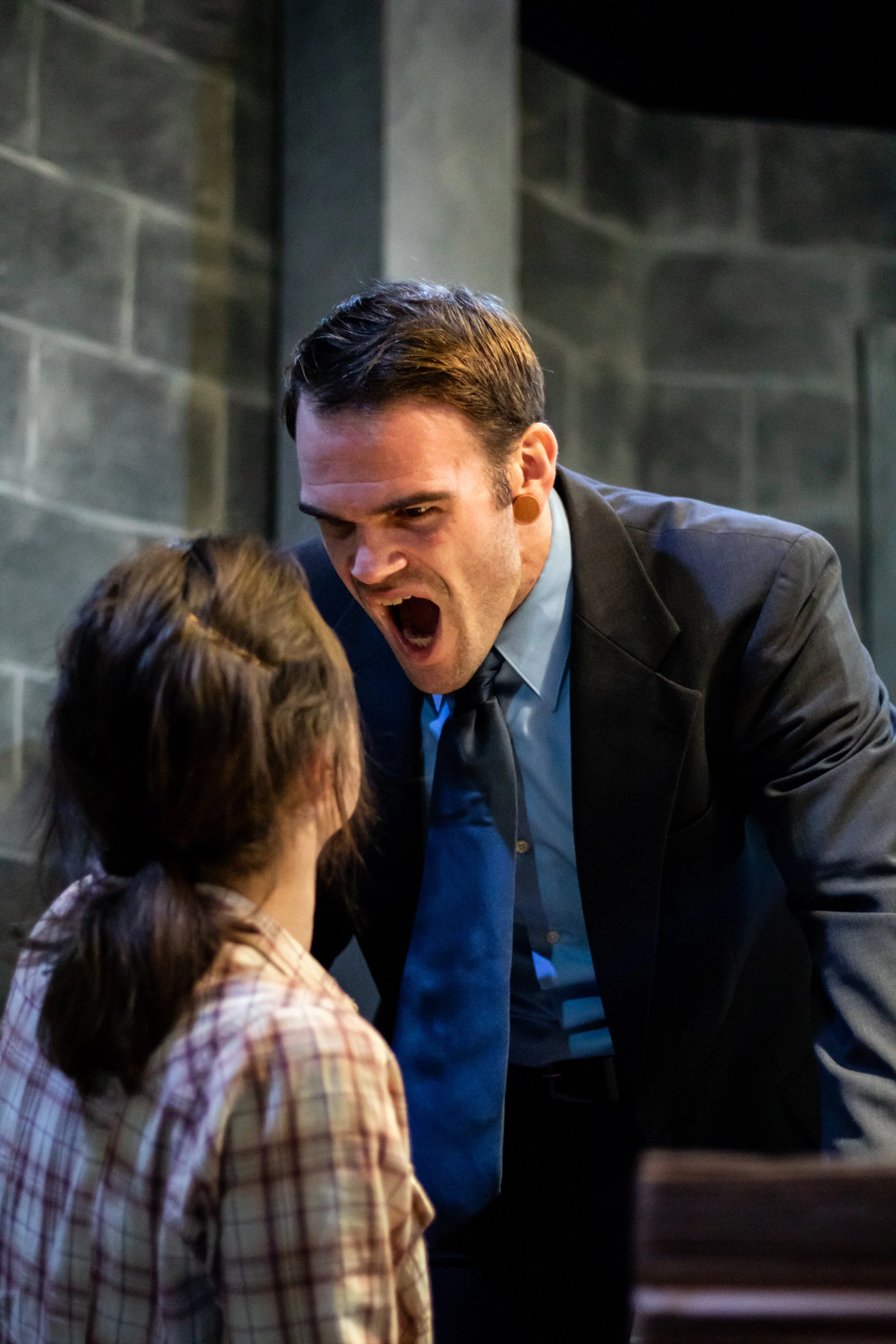 Rose Grizzell as Katurian, and Rob Schreiner as Ariel in The Constructivists' production of “The Pillowman,” by Martin McDonagh, Directed by Jaimelyn Gray. Photos by Christal Wagner Photography. October 26 – November 10, 2018 at The Underground Collaborative, 161 W. Wisconsin Ave, Milwaukee, Wisconsin.